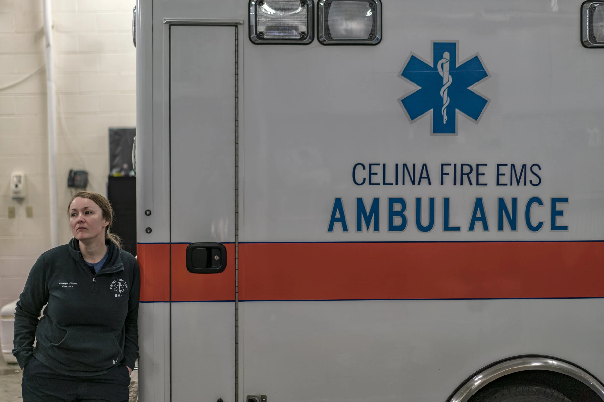 Celina EMS, Jennifer, watches T.V. in between calls in the final hours of the Cumberland River Hospital’s operation.
