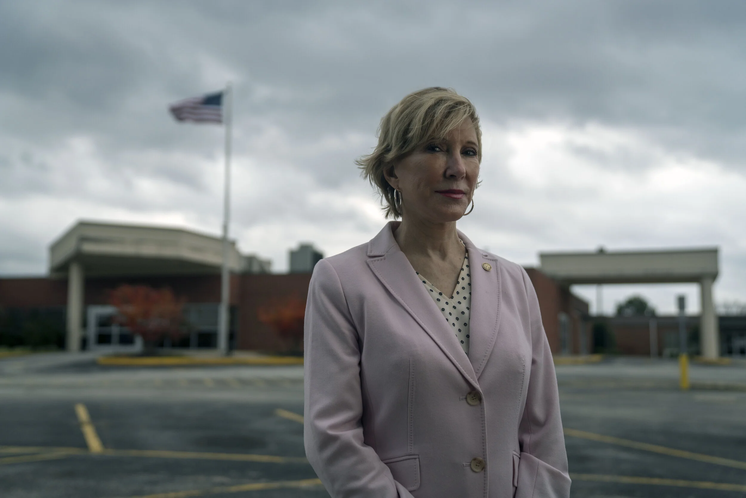Mayor Jill Holland stands in front of the shuttered McKenzie Regional Hospital, the only hospital within a forty-five minute drive of McKenzie. More hospitals have closed their doors in Tennessee per capita than any other state in the country.