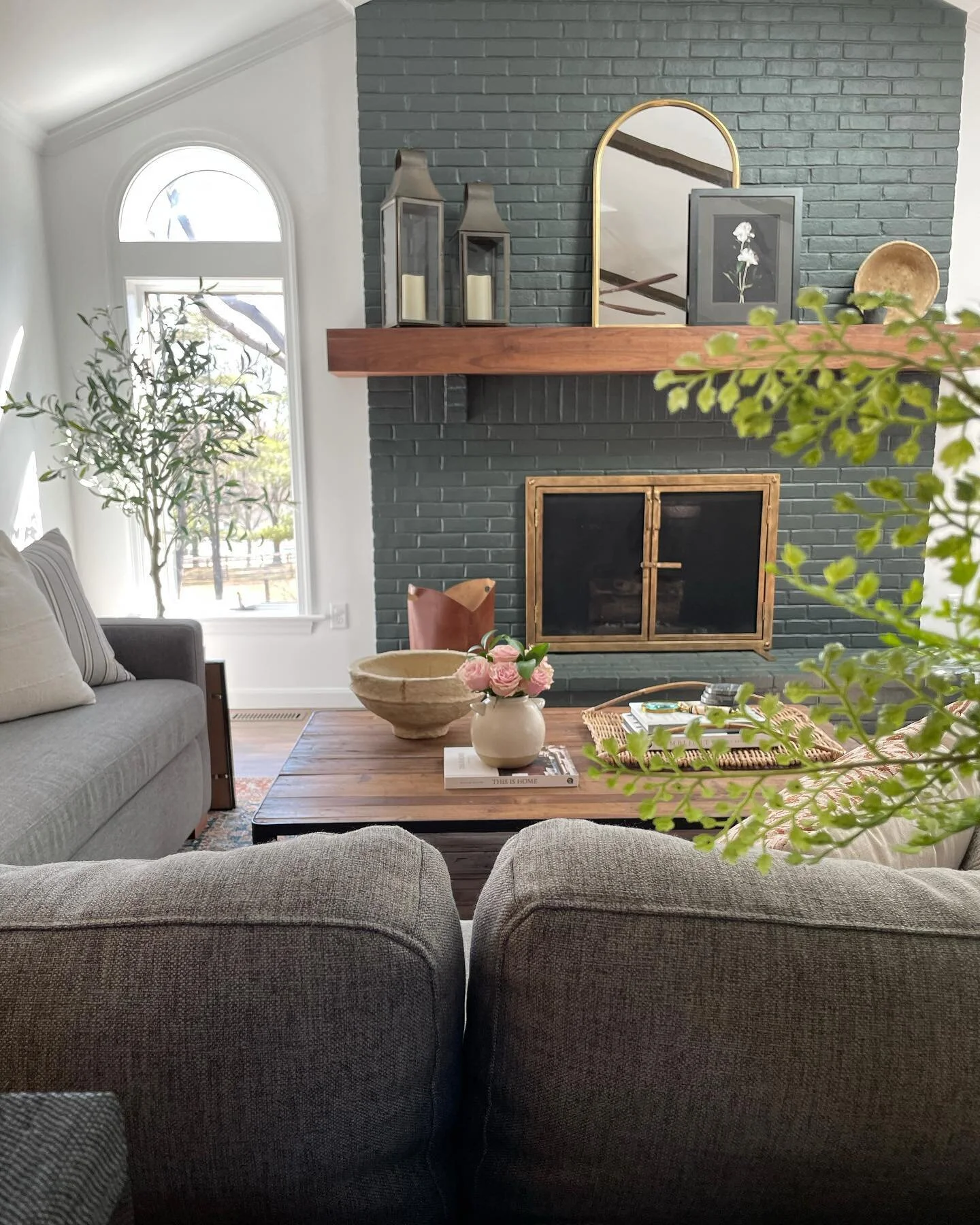 In honor of St. Patrick&rsquo;s day, here&rsquo;s another view of our recent living room install and that beautiful hearth painted Studio Green by @farrowandball 🍀