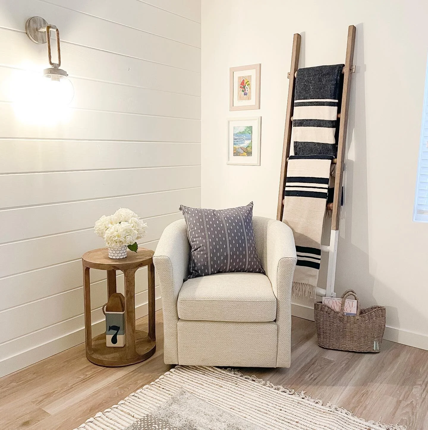 The perfect reading nook in this coastal inspired basement makeover we recently installed! So happy to give this client a calm, relaxing space to enjoy with family and friends.