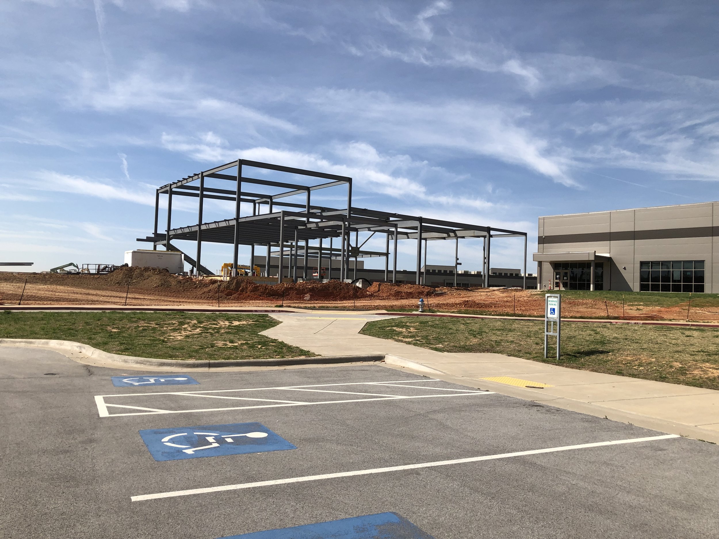 Steel rises for a new expansion to the Don Tyson School of Innovation in Springdale.
