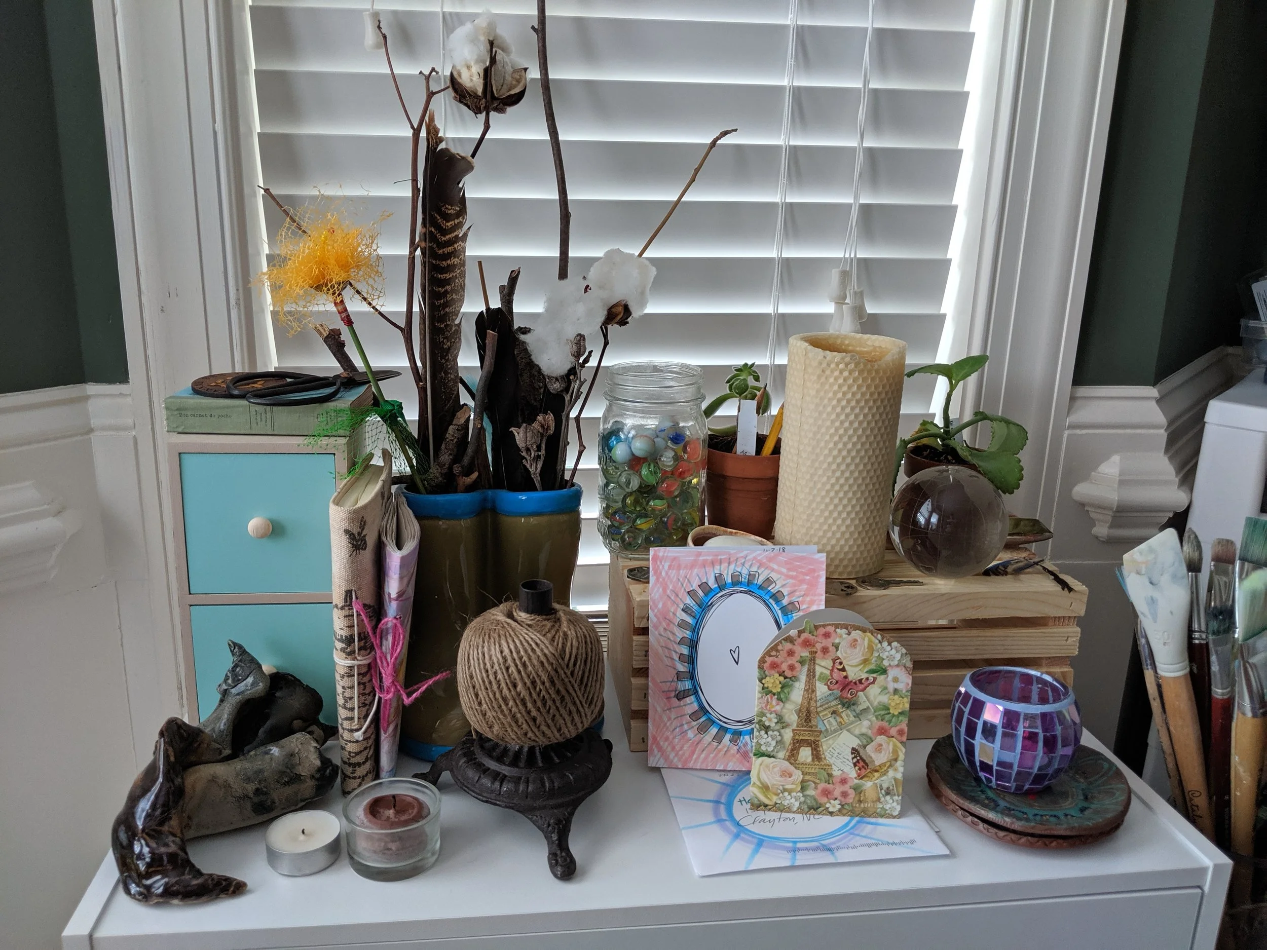 I love small things. Stepping into my studio inspires me when they are laid out for me to see all the colors and feel the textures.