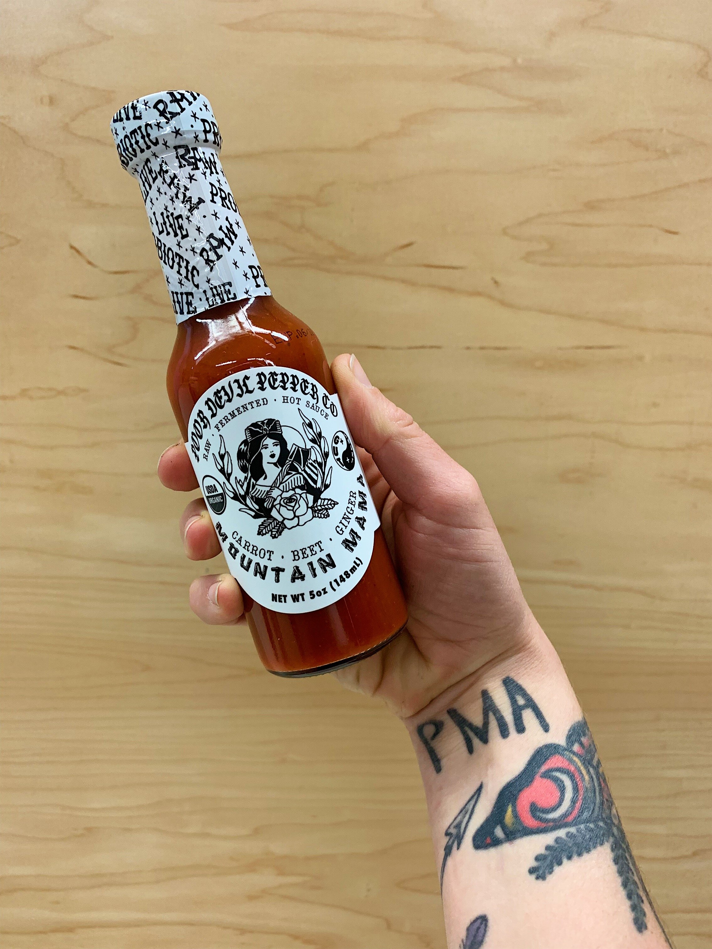 Mountain Mama/ a powerhouse that combines an array of hot peppers and root vegetables for a versatile spicy sauce. You'll want it on every meal, forever!
