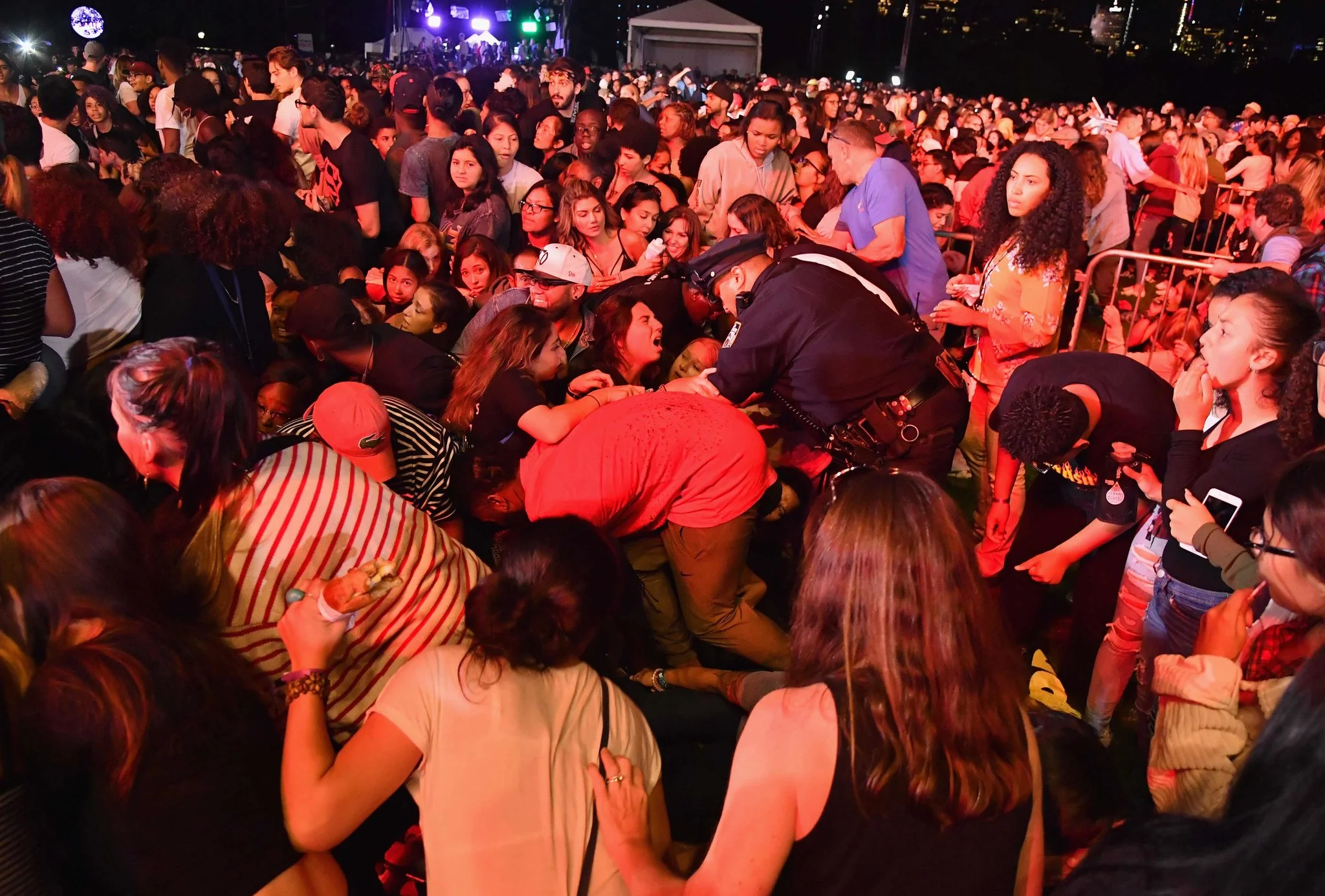 Panic spread through the crowd gathered for the Global Citizen Festival in Central Park on Sept. 29 after people scattering away from a fight stepped on empty water bottles, causing loud popping sounds.CreditCreditAngela Weiss/Agence France-Presse — Getty Images