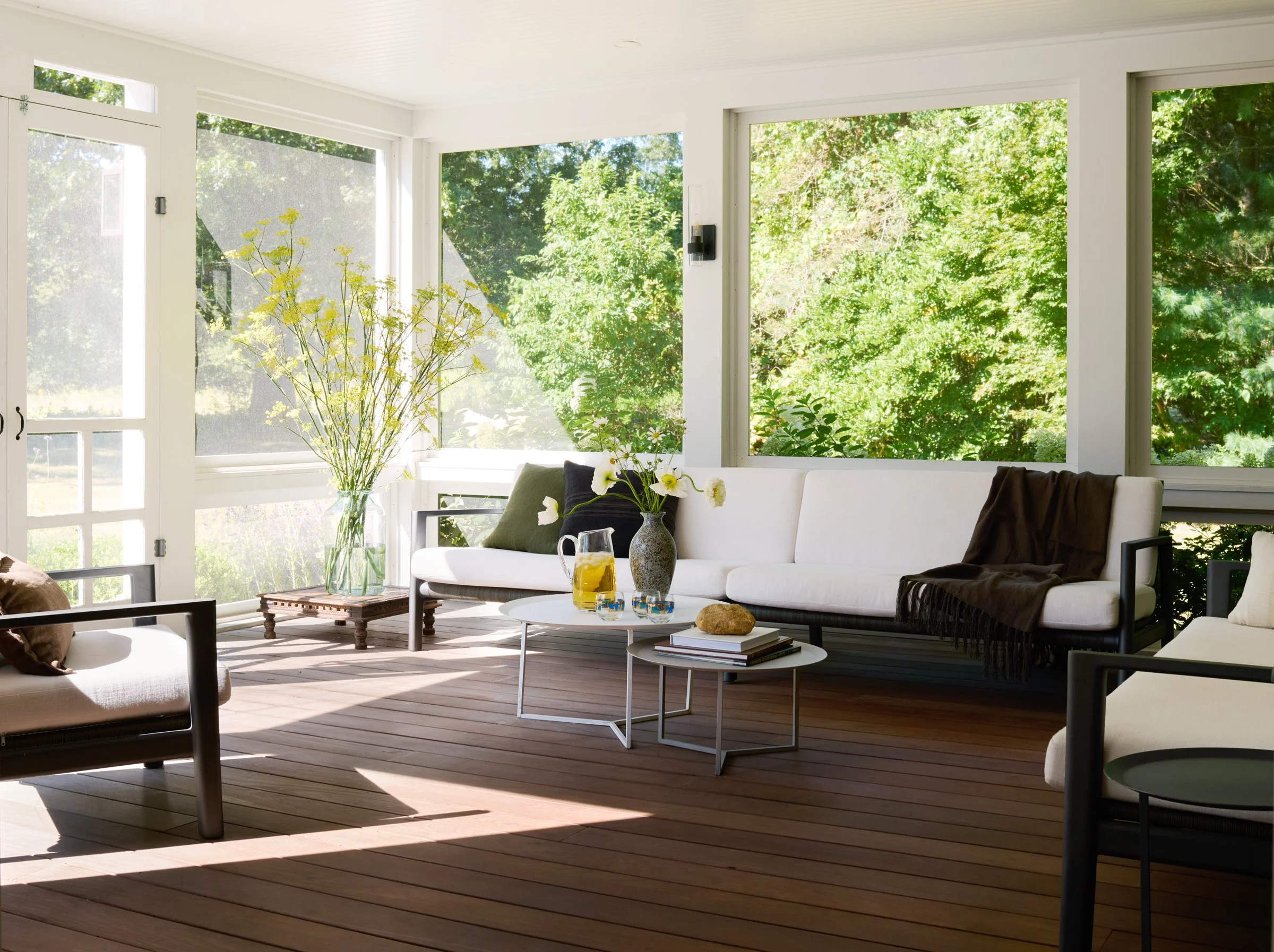 Old Black Point, CT screened in porch designed by C. Kramer Interiors