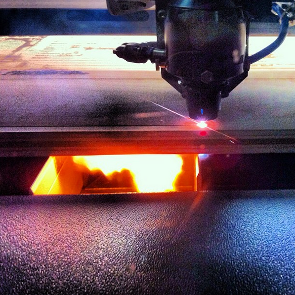 Laser cutter cutting material