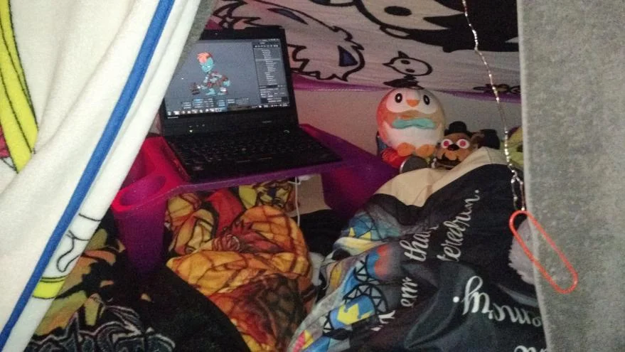 My literal cave, the comfiest of workspaces.