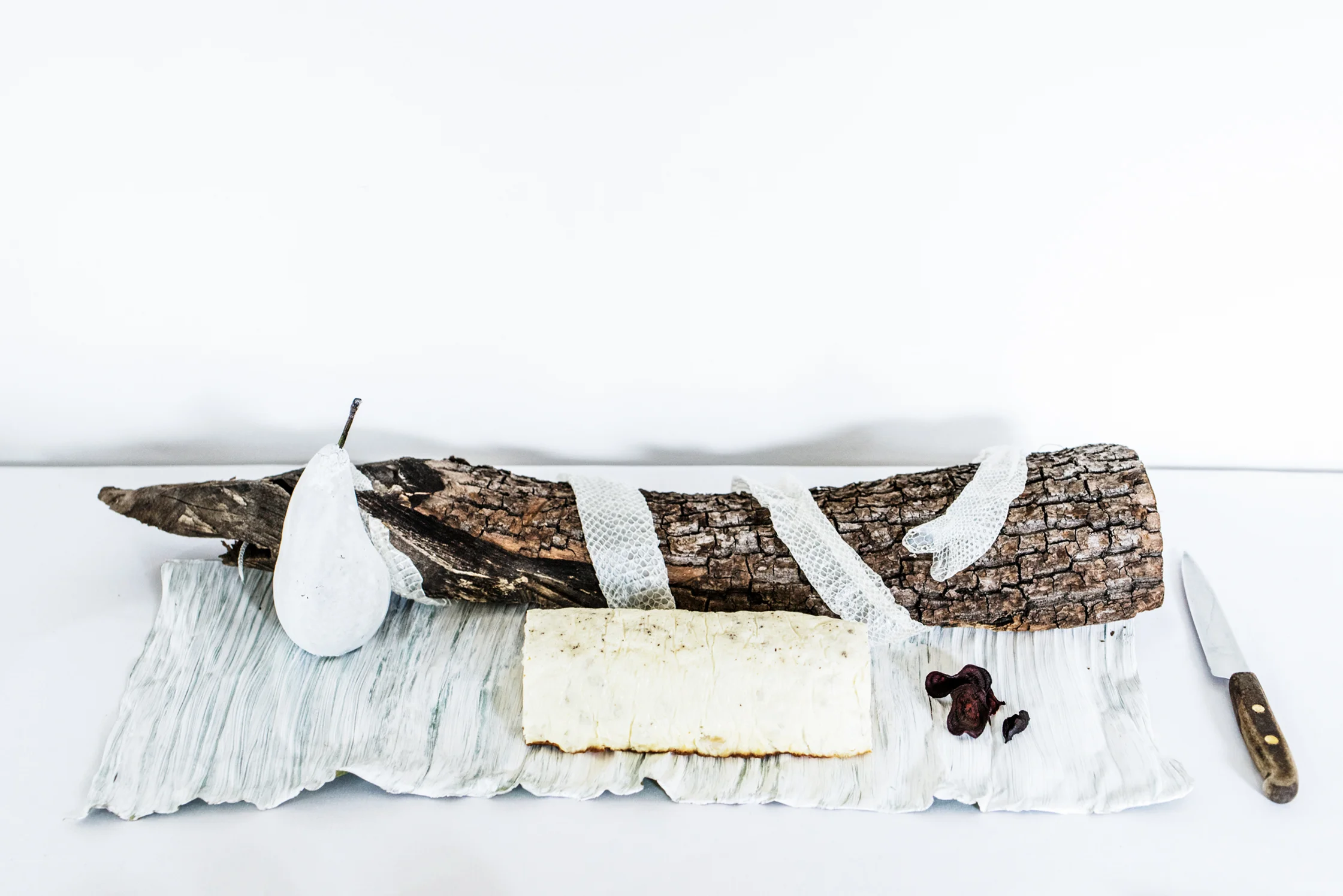 White Fruit, Snake Skin Shed, Cauliflower Terrine, Beetroot Crisp. Sapour Somnia, 2017. Edible installation in collaboration with Maya Merhi. The Dream Society group show at Salong Odengatan, Stockholm. Photo by Ari Luostarinen.