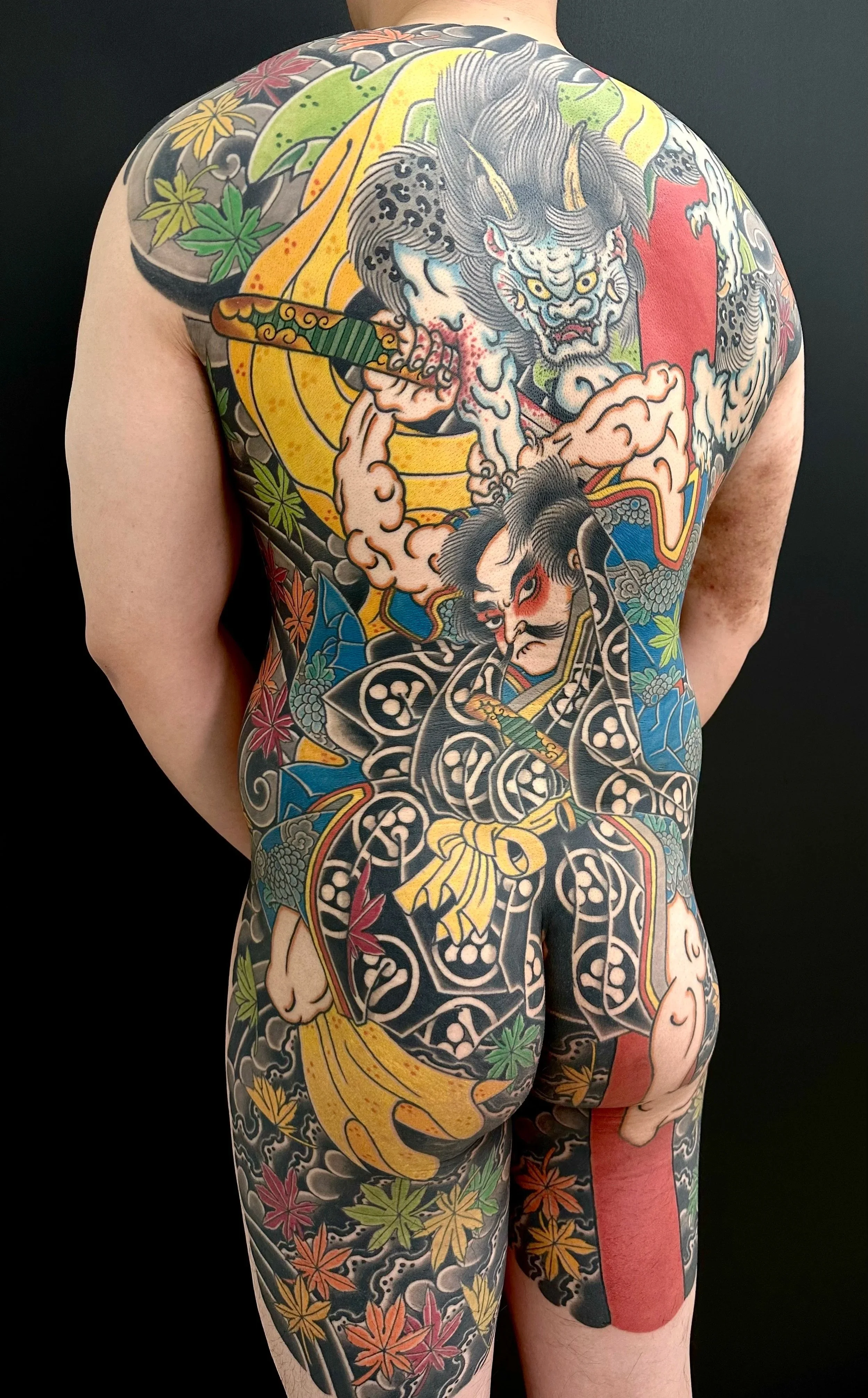 Japanese back tattoo with samurai and oni