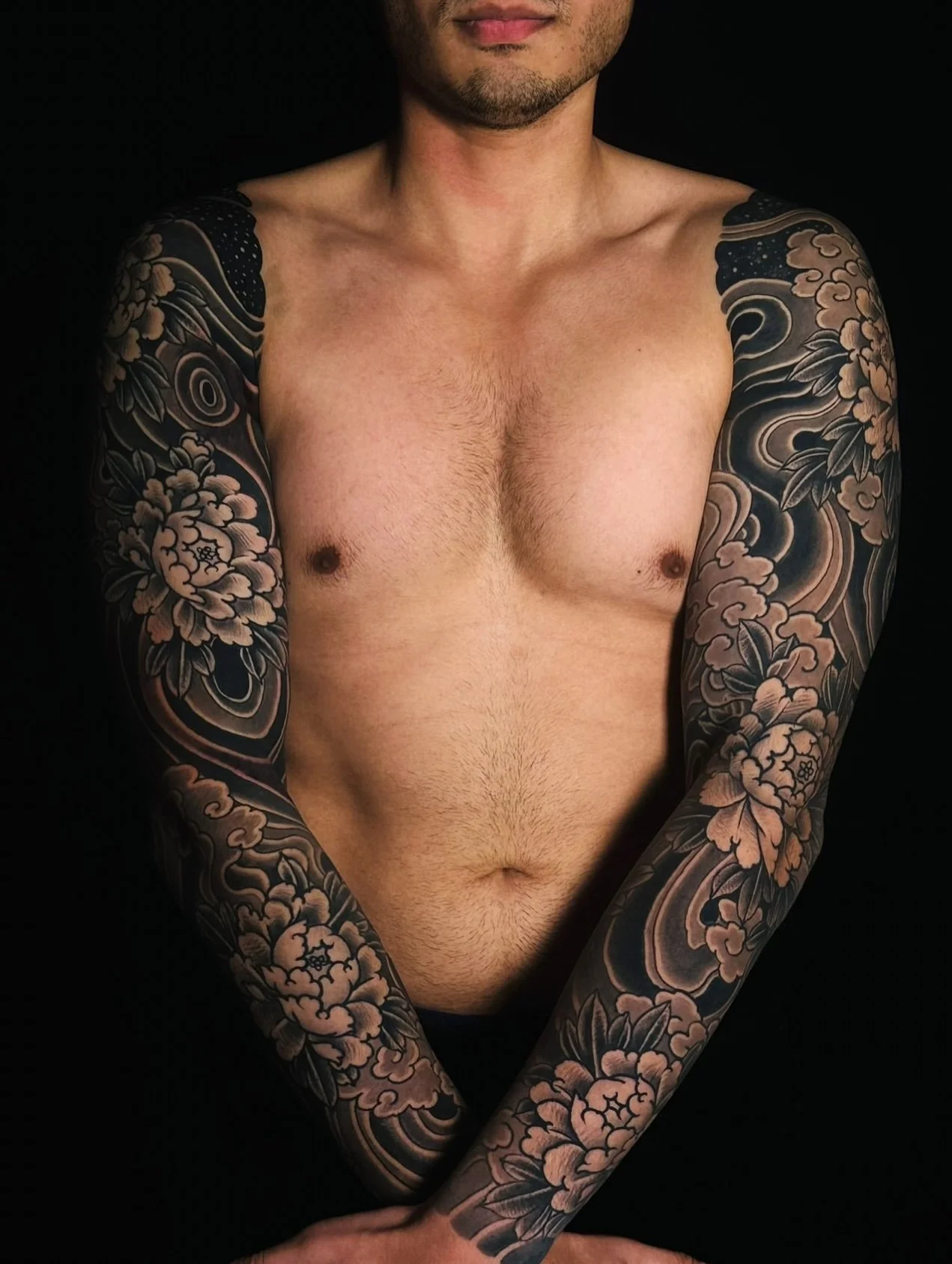 Japanese arm sleeve tattoo with Peonies