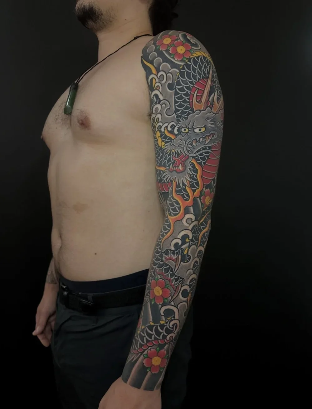 japanese-dragon-arm-sleeve-tattoo-auckland.webp