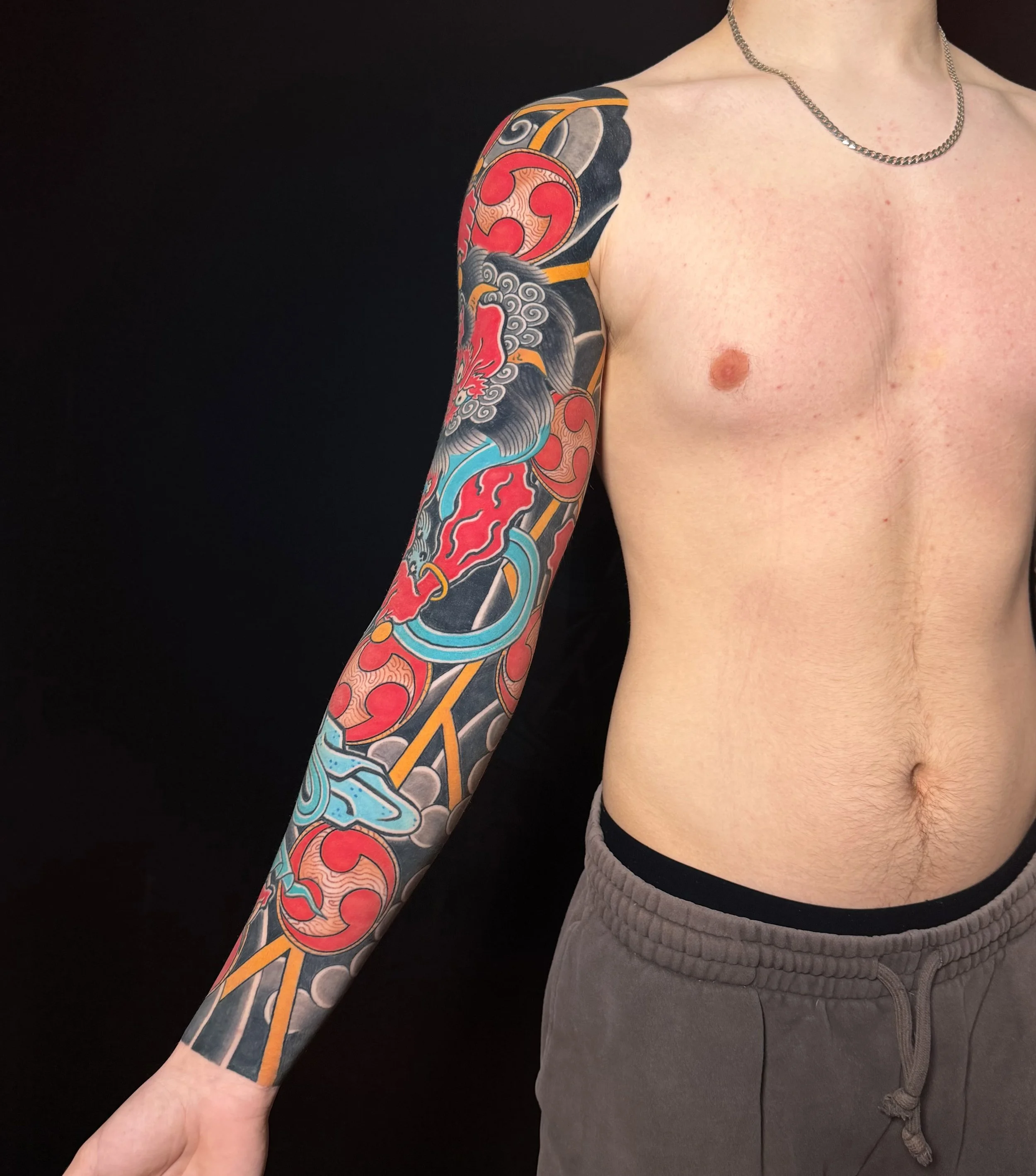 Japanese Raijin Arm Sleeve Tattoo