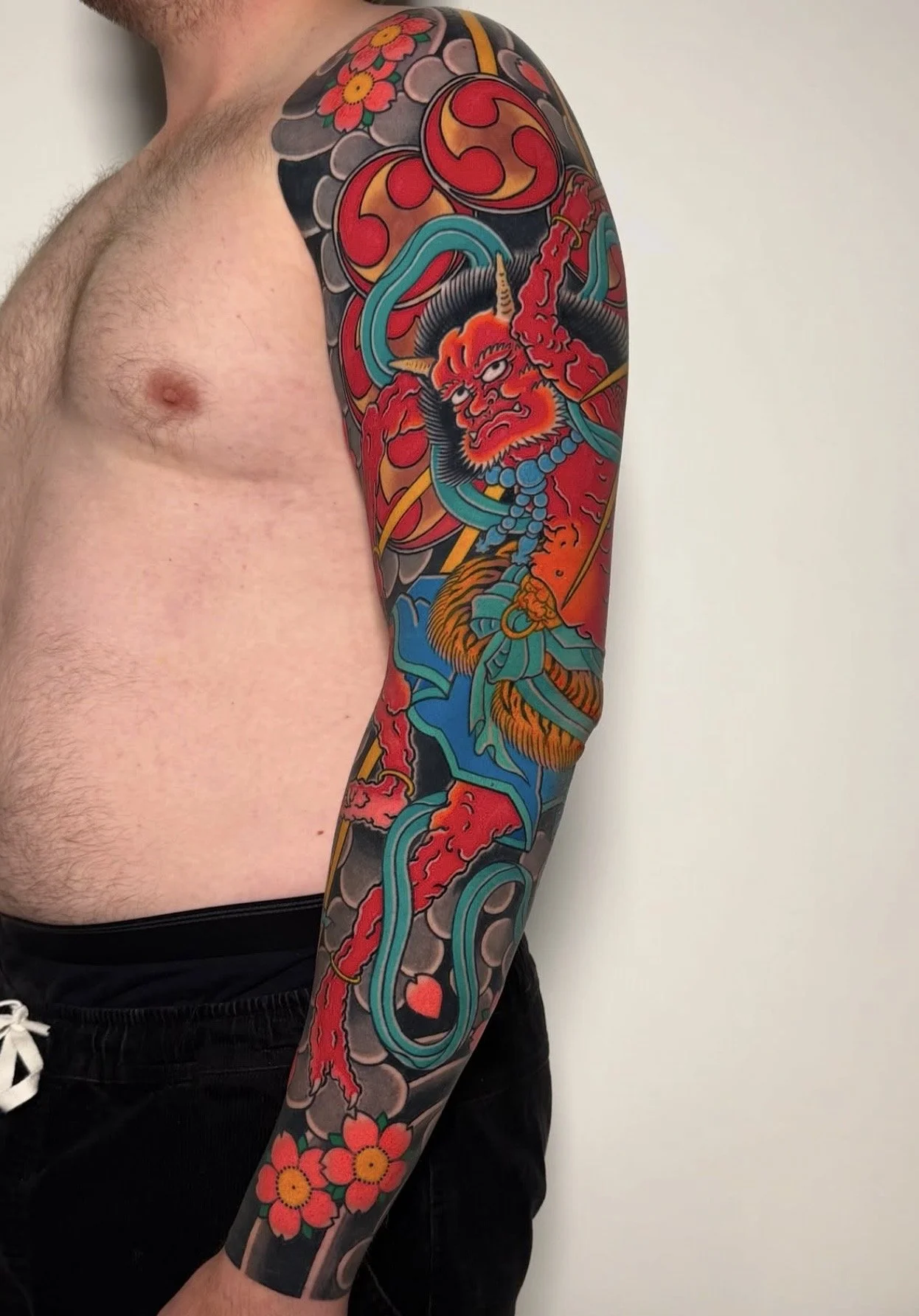 Japanese Raijin Arm Sleeve Tattoo