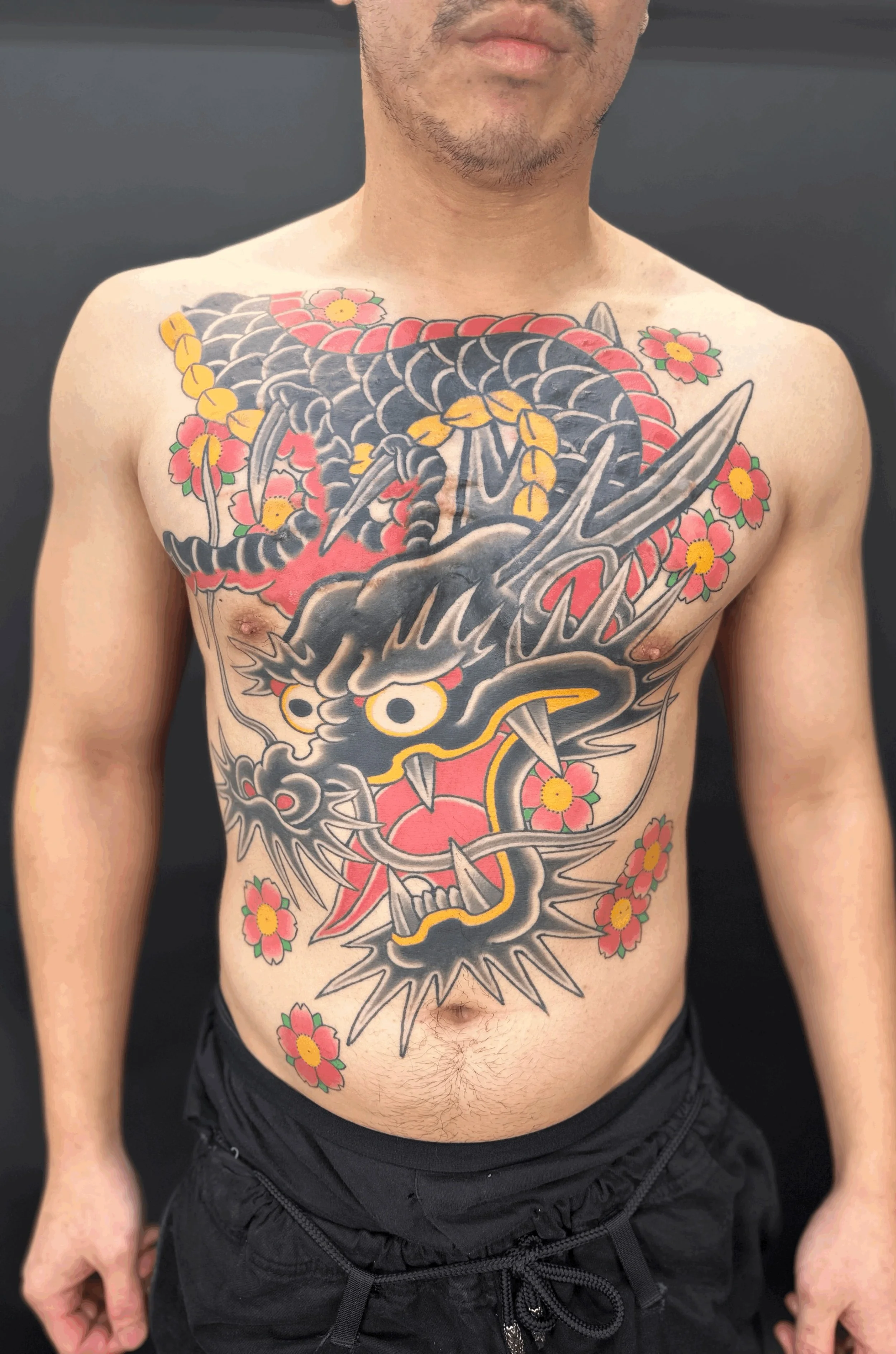 Japanese Dragon Chest Tattoo by TomTom at Sunset Tattoo in Auckland, New Zealand