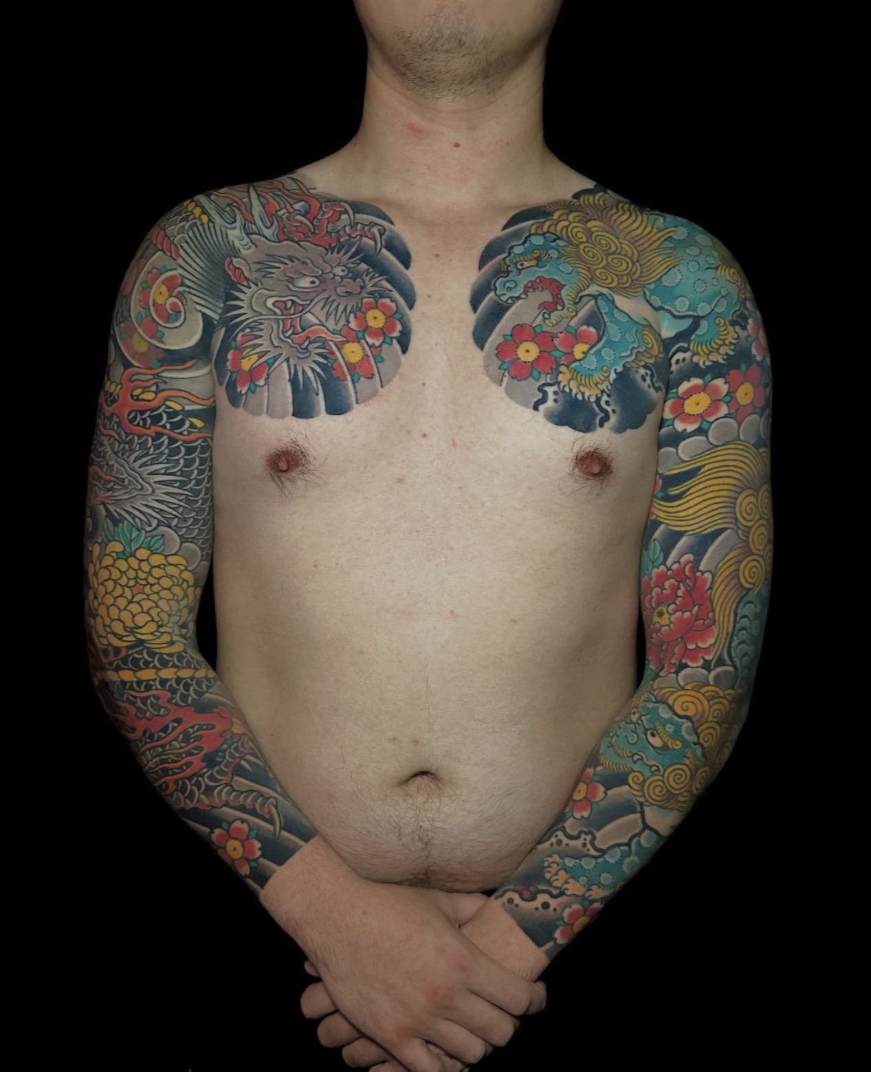 Japanese Dragon and Fu dog Arm Sleeve Tattoo by TomTom at Sunset Tattoo in Auckland, New Zealand