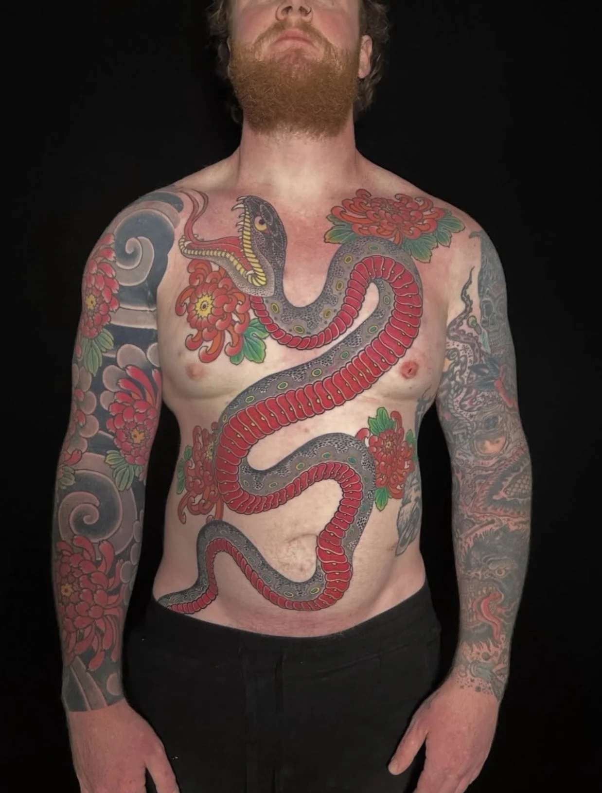 Japanese Snake Chest Tattoo by TomTom at Sunset Tattoo in Auckland, New Zealand