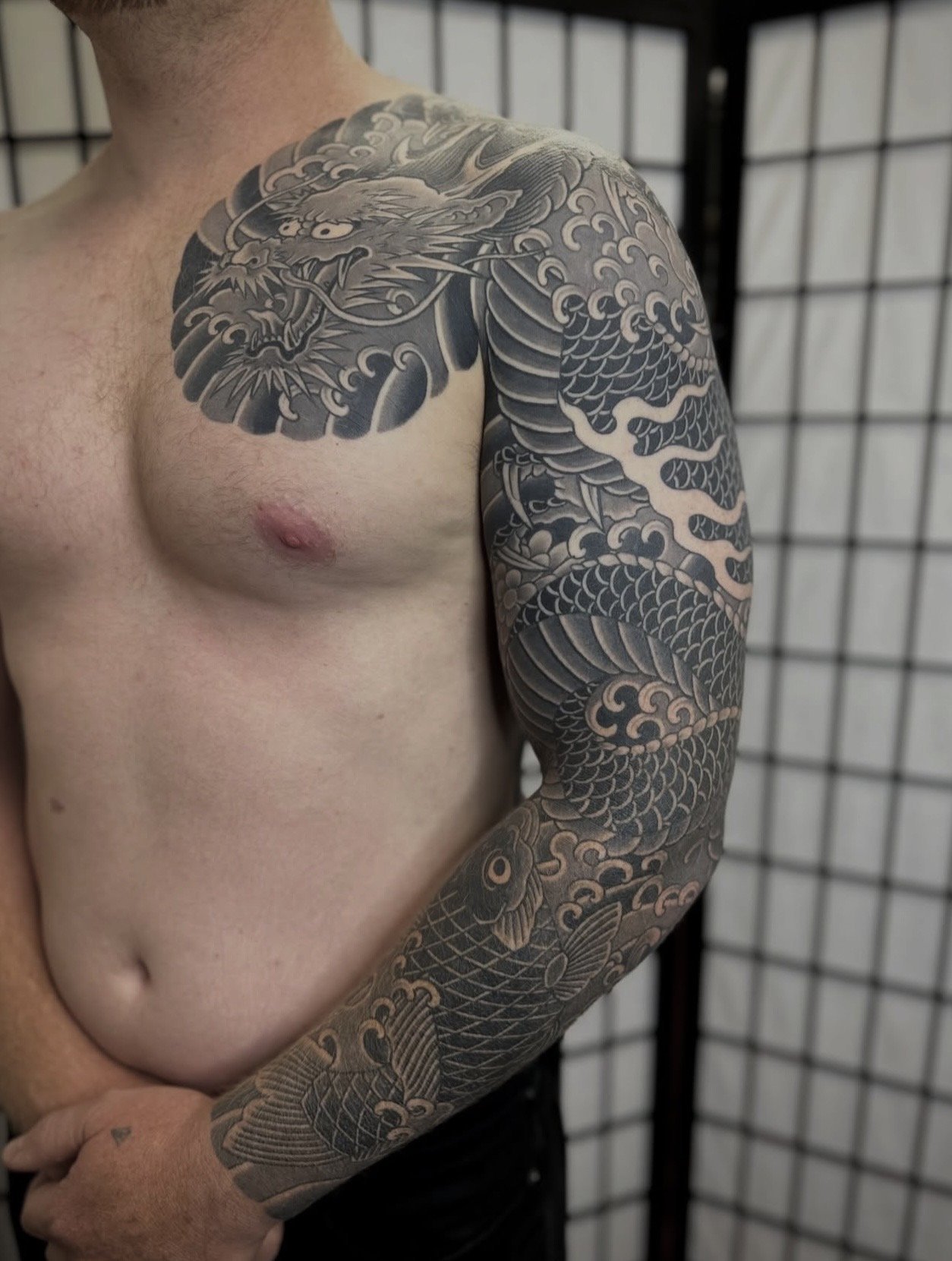 Japanese Dragon Arm Sleeve Tattoo by TomTom at Sunset Tattoo in Auckland, New Zealand