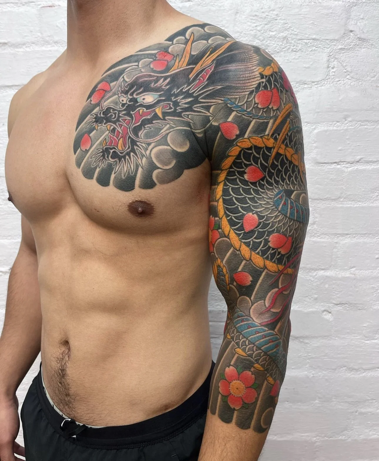 Japanese Dragon Arm Sleeve Tattoo by TomTom at Sunset Tattoo in Auckland, New Zealand