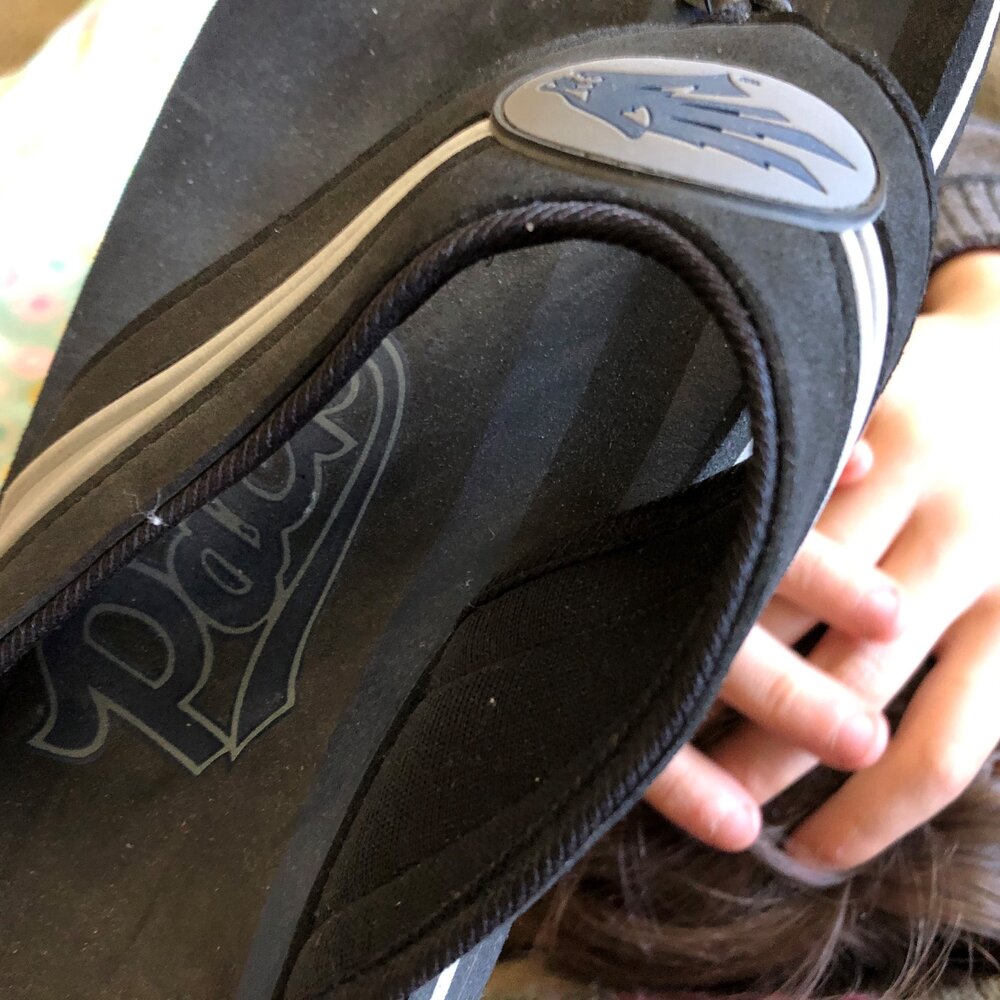 Mommas have been beating their children with flip-flops since the flip-flop was invented. Could be worse. I used to get a plastic flyswatter. Photo by Bob Moffitt