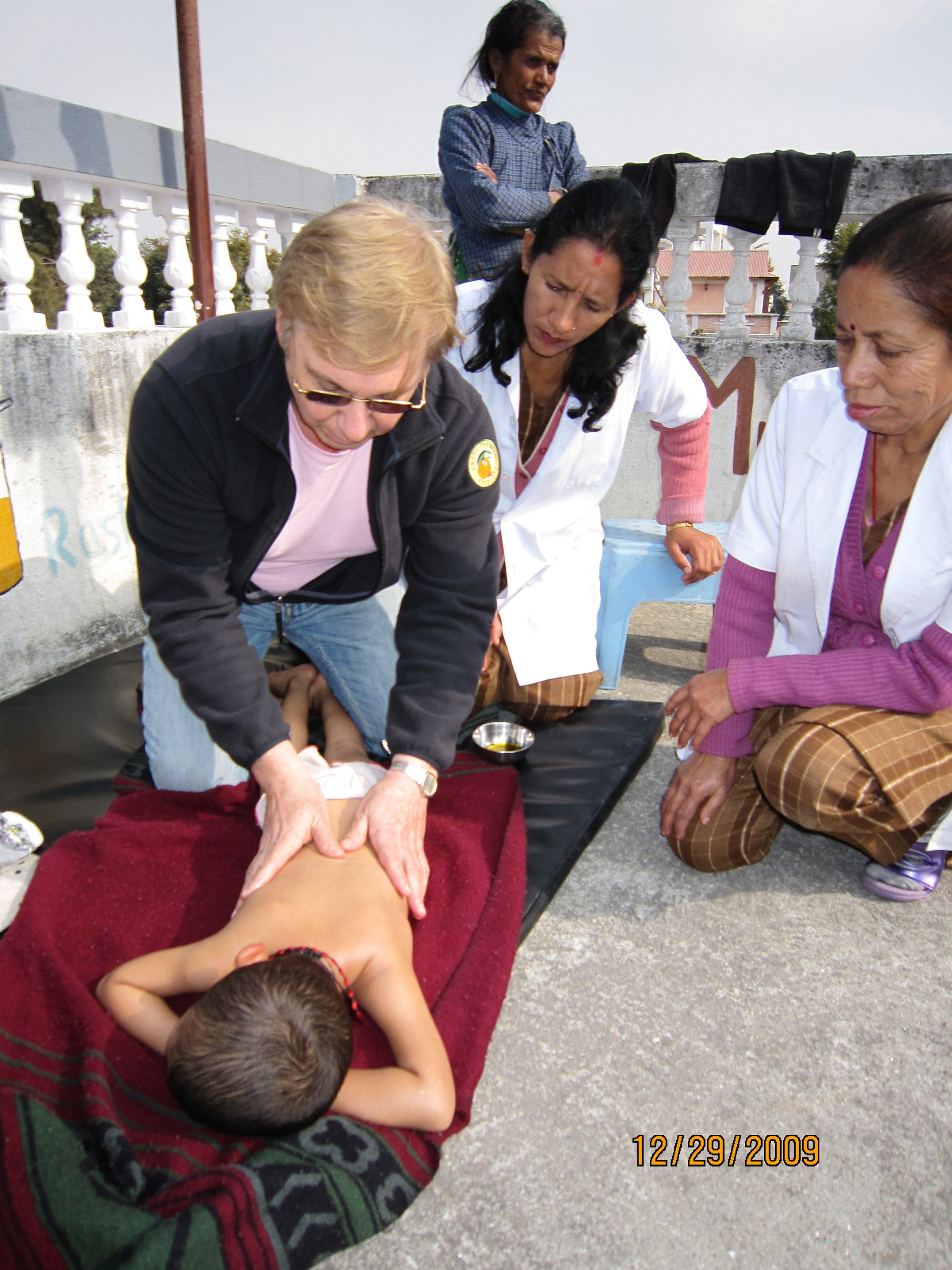 Nepal- Massage Therapy at Malnutrition Center 2.jpg