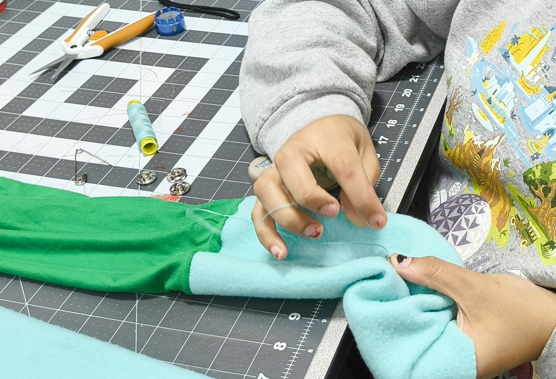 Channing Hand Sewing.png