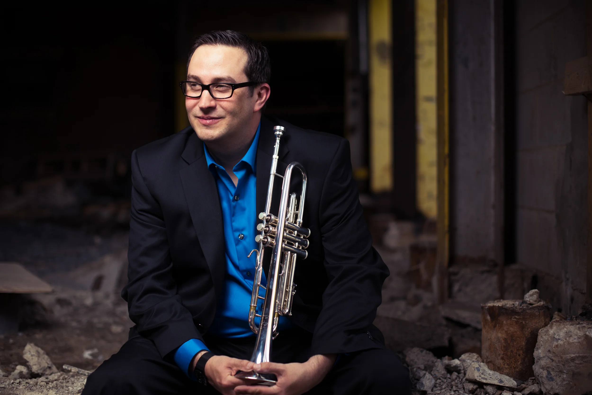 Chris Carrillo , trumpet Chris Carrillo joined the faculty of James Madison University in 2009 as the studio trumpet professor in the College of Visual and Performing Arts. He currently performs with the Madison Brass and the New Orchestra of Washington . Solo engagements and chamber collaborations have taken him throughout the United States, Australia, Germany, and the United Kingdom performing in some of the world's finest concert halls including Carnegie Hall in New York City, the Kennedy Center for the Performing Arts in Washington, D.C., and City Recital Hall in Sydney, Australia.