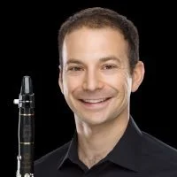 Jeremy Eig , clarinet An active orchestral musician, he has performed with the Cleveland Orchestra and Kansas City Symphony and in such halls as Carnegie Hall, Seoul Arts Center, Shanghai Grand Theatre, and the National Center for the Performing Arts in Beijing. He has served in the US Navy Band since July 2012, and holds the rank of Musician 1st Class. Dr. Eig is a devoted advocate for new music, and particularly the expansion of the clarinet solo literature. In 2009, he founded the Clarinet Commission Collective, which helps individual clarinetists pool their resources to commission major composers to write for the clarinet. In addition to commissioning, Dr. Eig is also an enthusiastic arranger, and publishes his editions of transcriptions for solo clarinet and clarinet ensemble through JTown Publications.