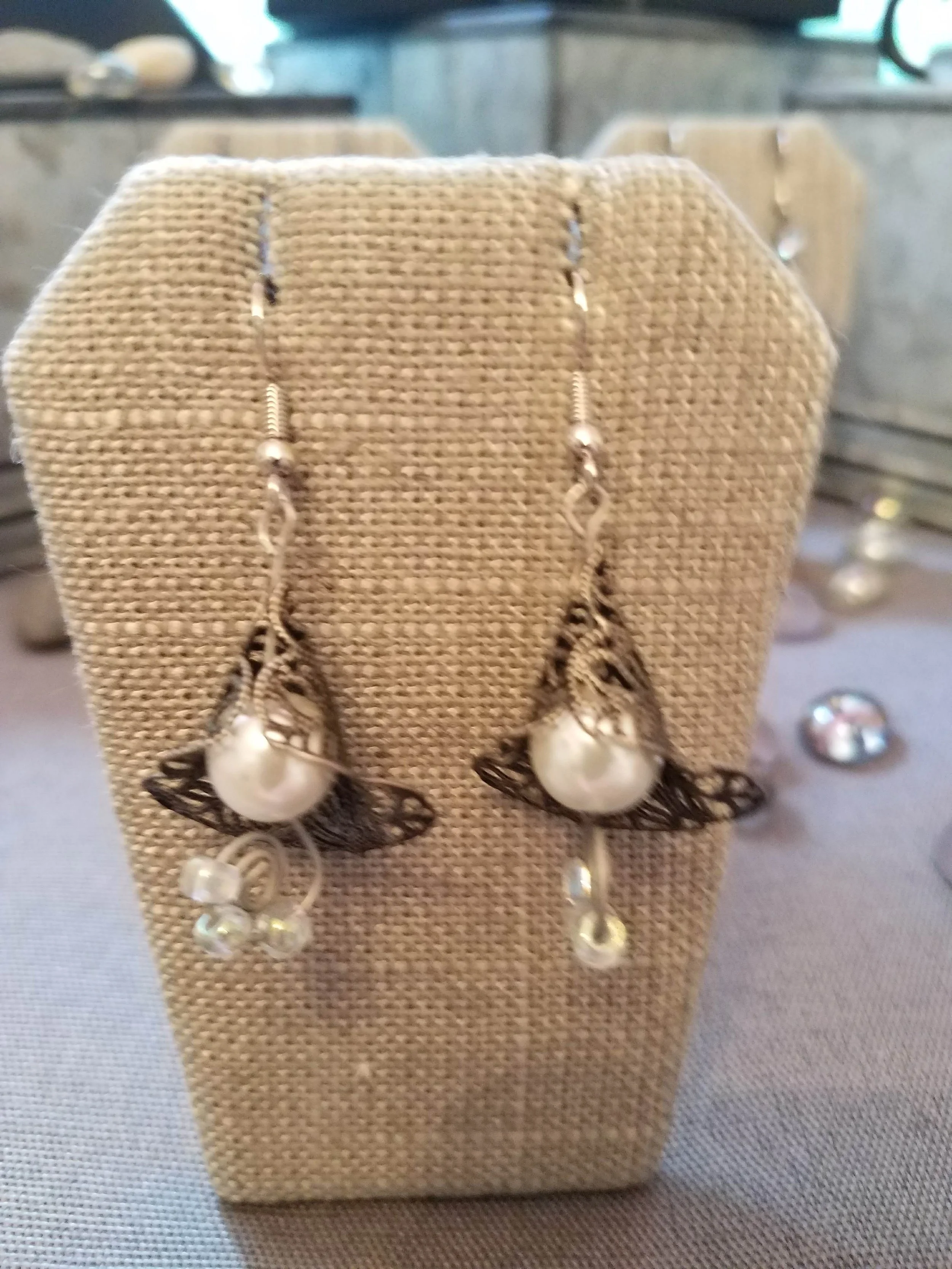 Antique silver filigree flower bell with faux pearl iridescent glass beads