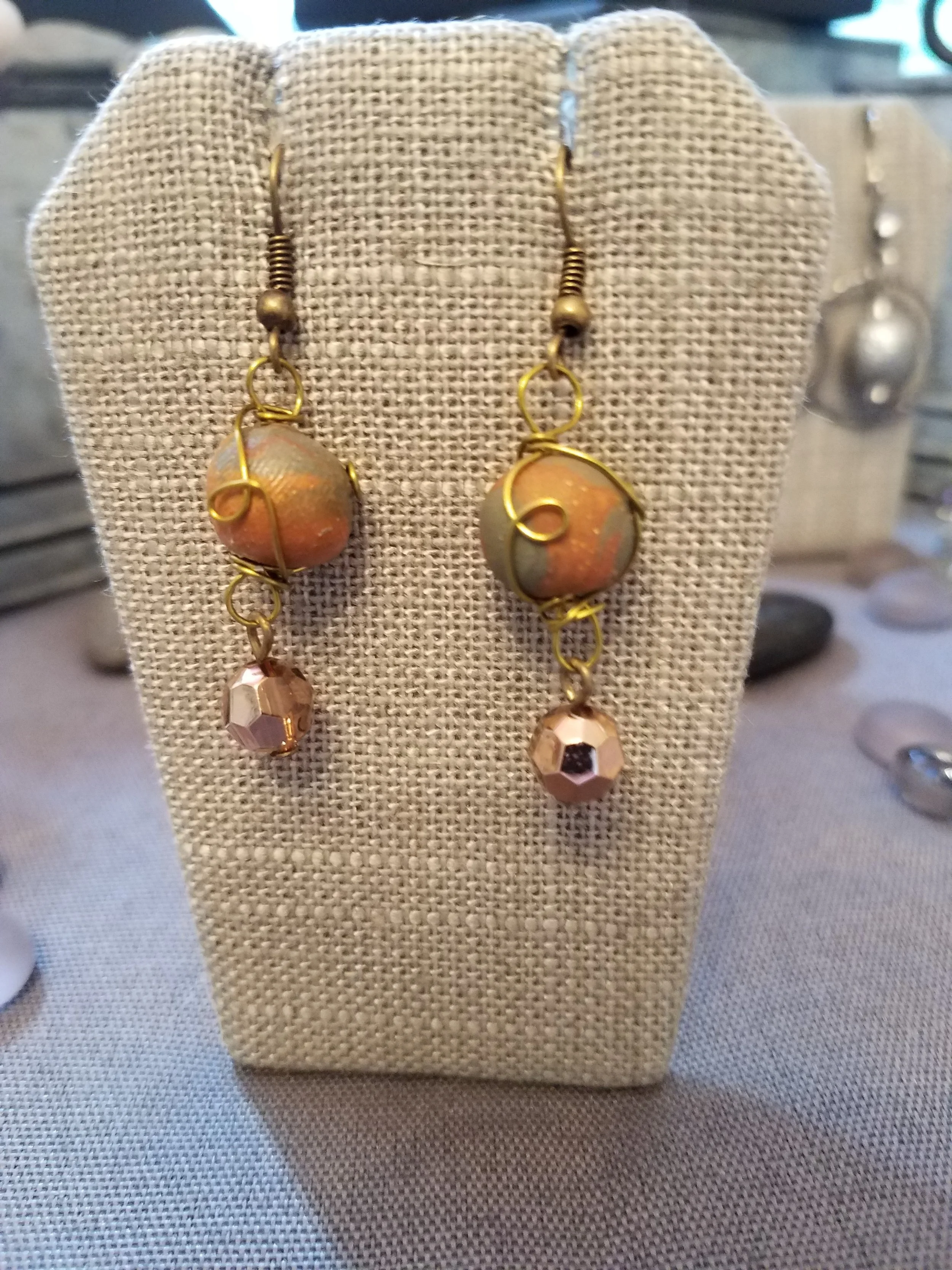 Green and gold polymer clay and round peach crystals