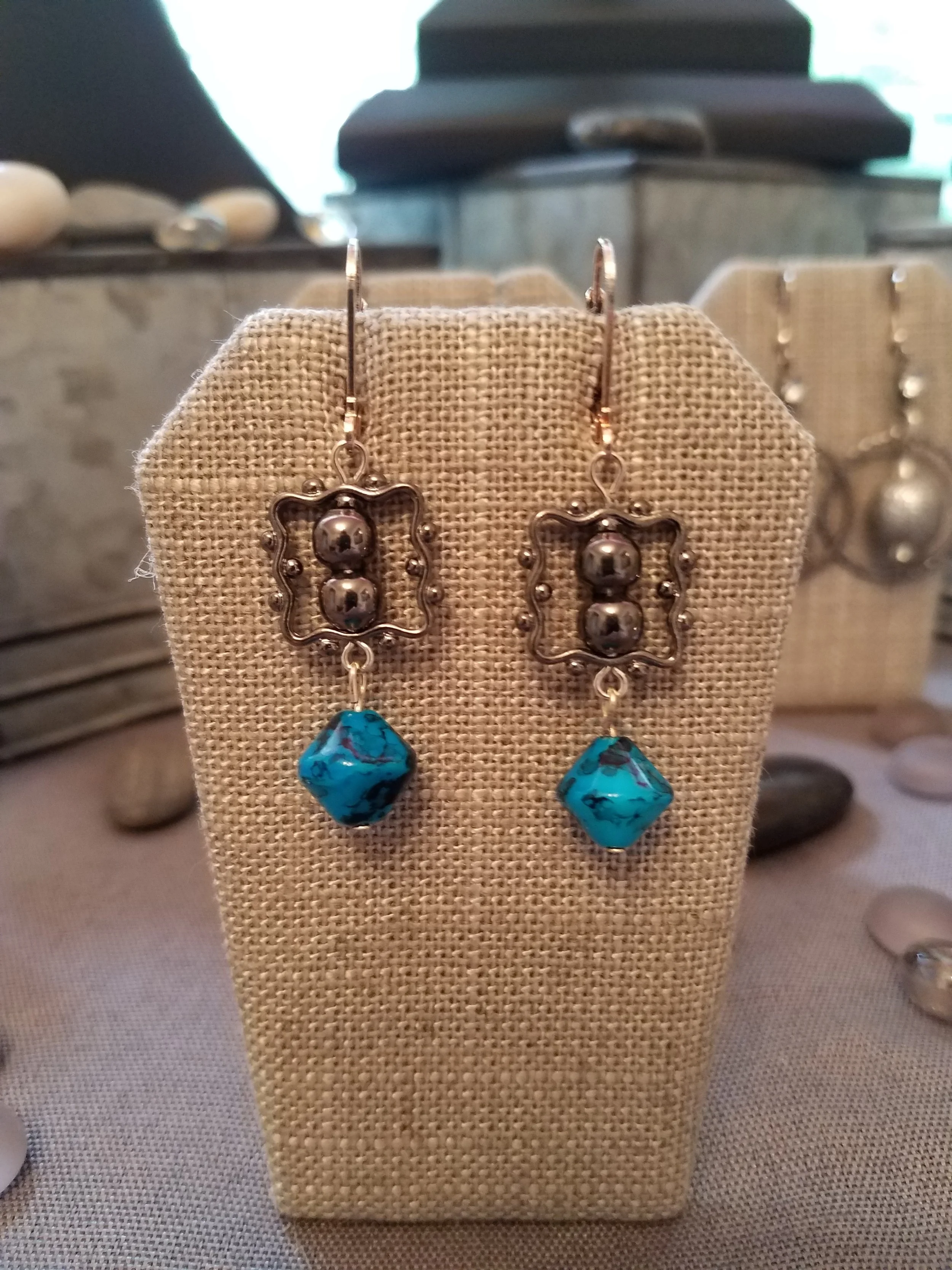 Hematite color frame and bead with turquoise bead