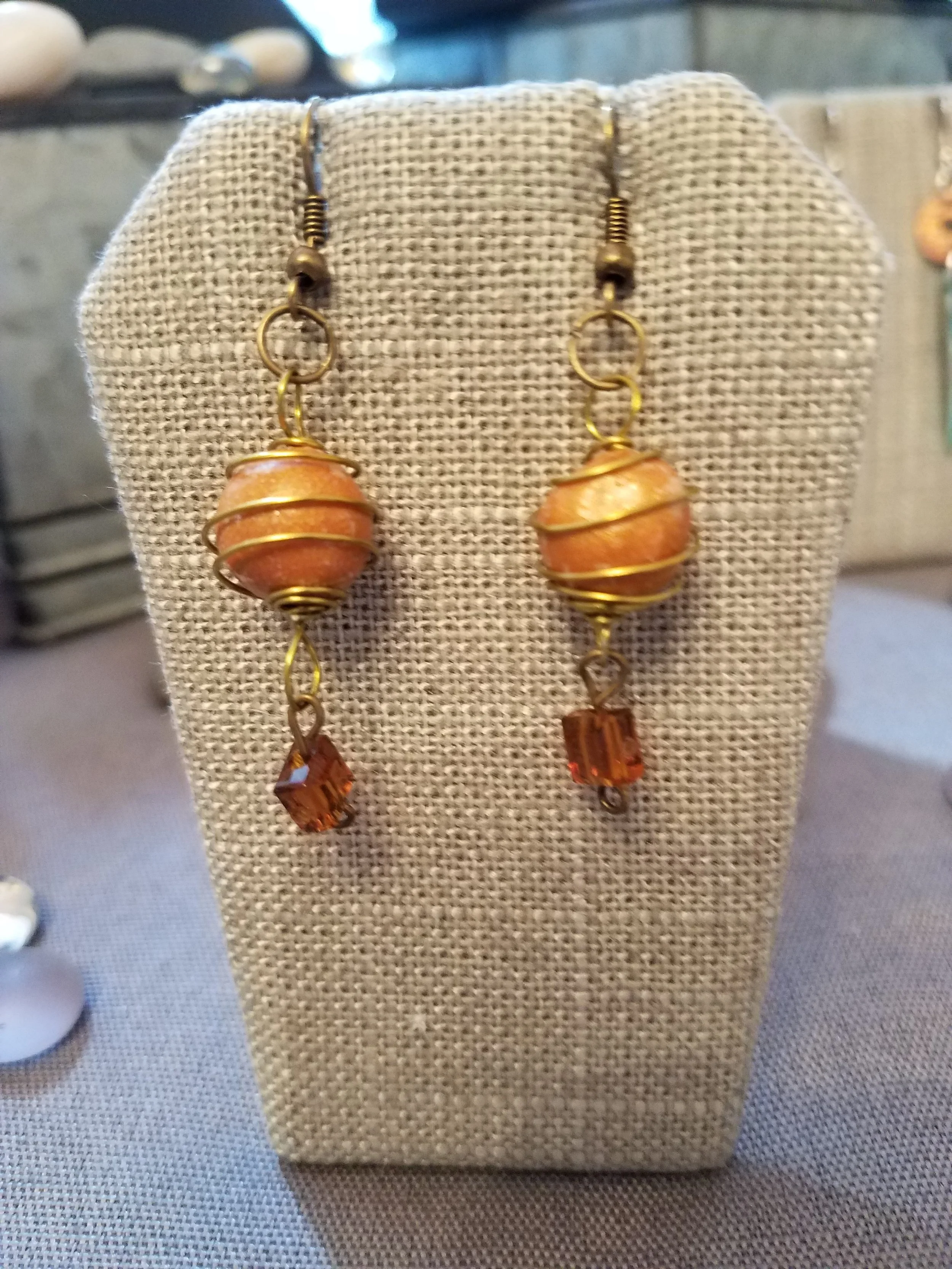 Gold polymer clay bead with brown crystal 