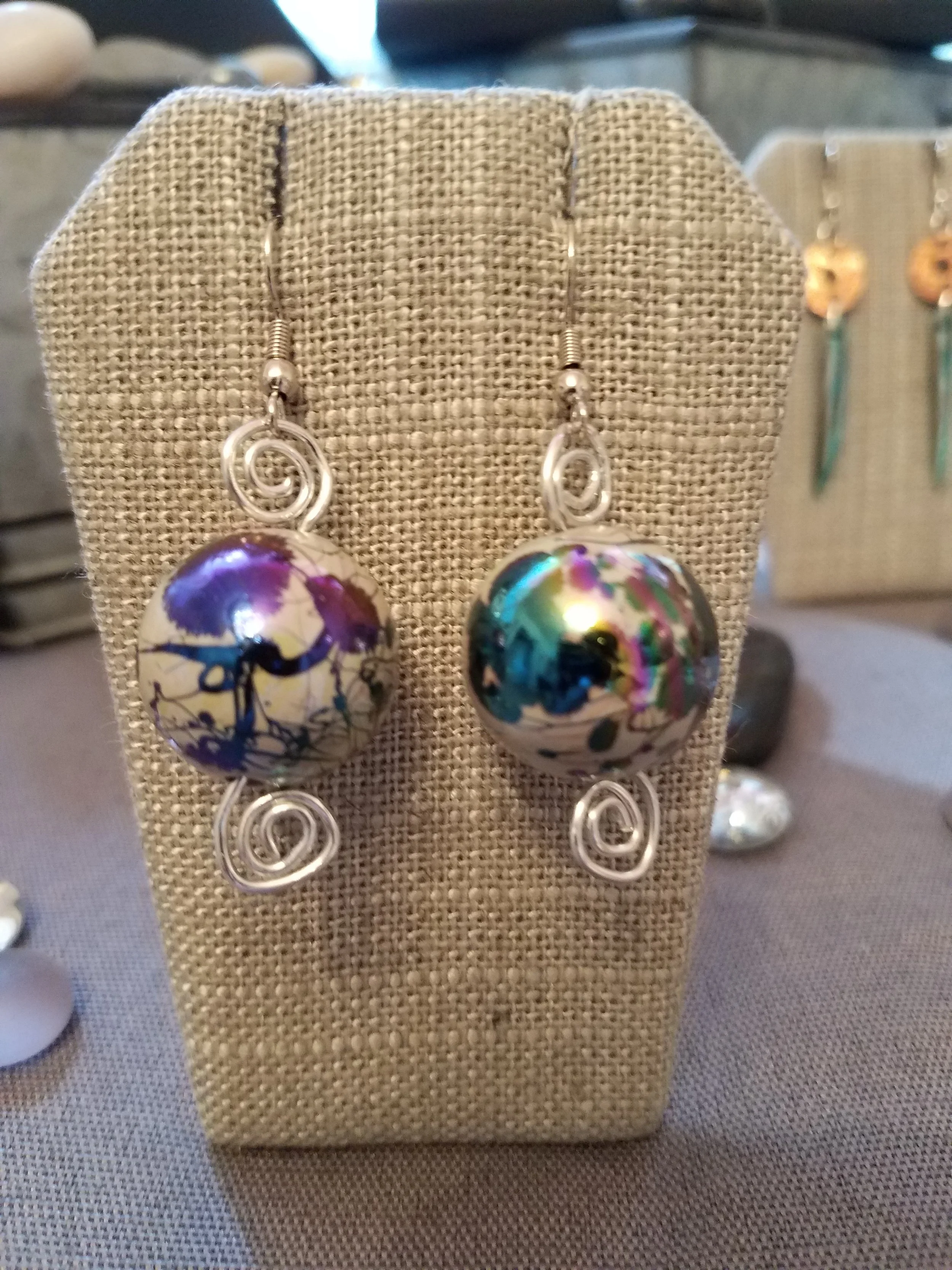 Purple multi paper mache beads with silver curls 