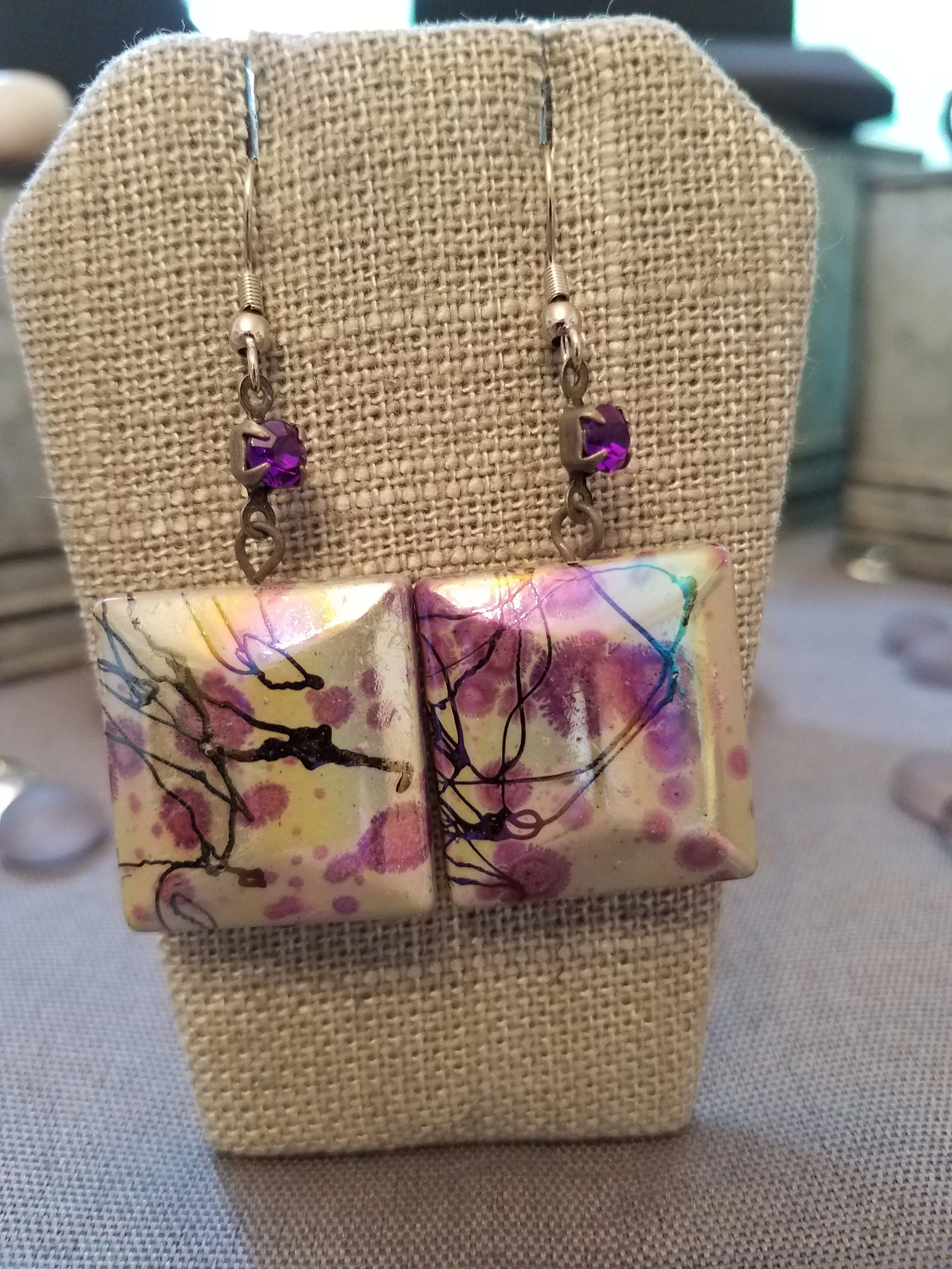 Multipurple paper mache bead with purple crystal