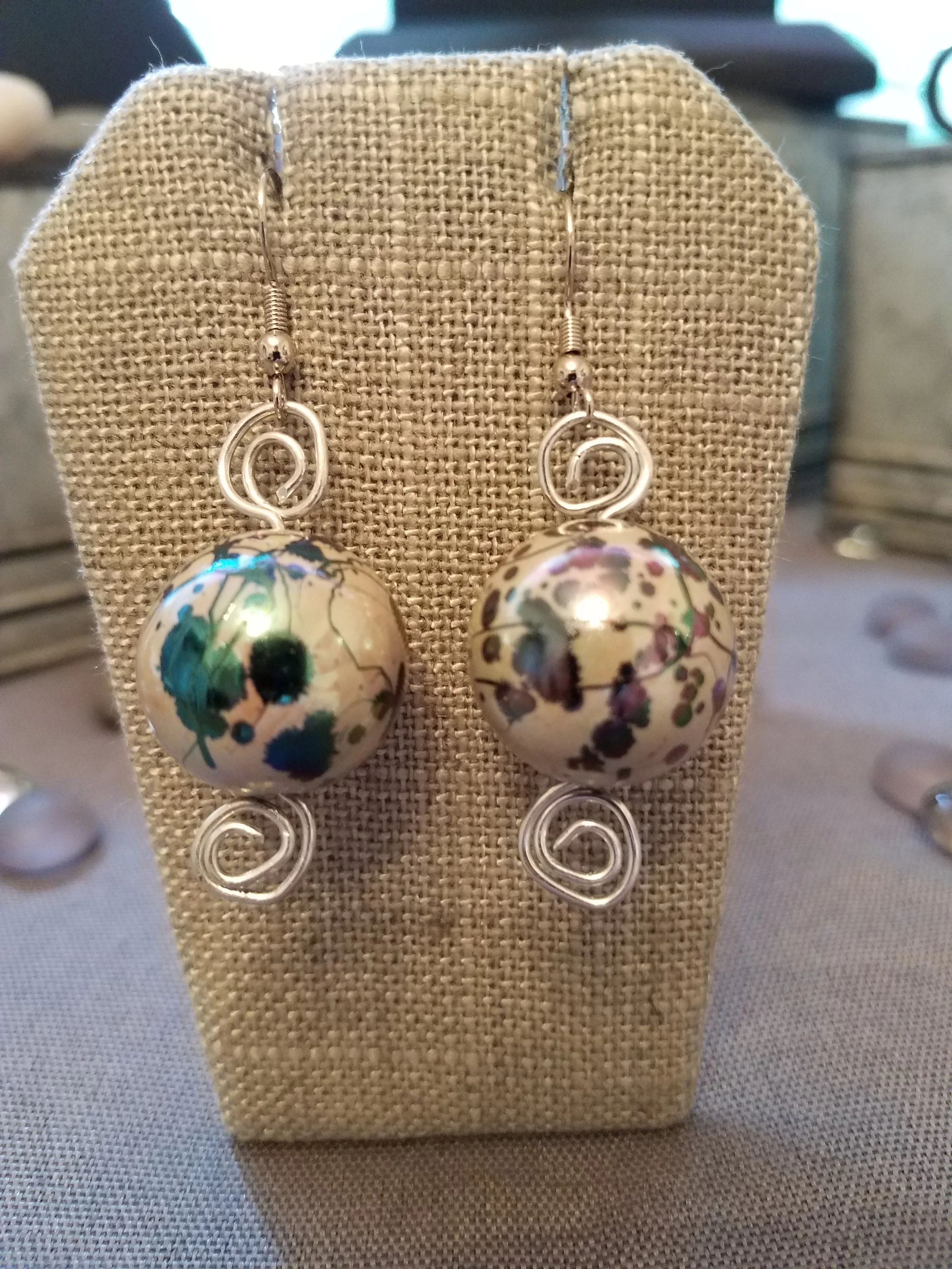 Multipurple paper mache bead with silver curls