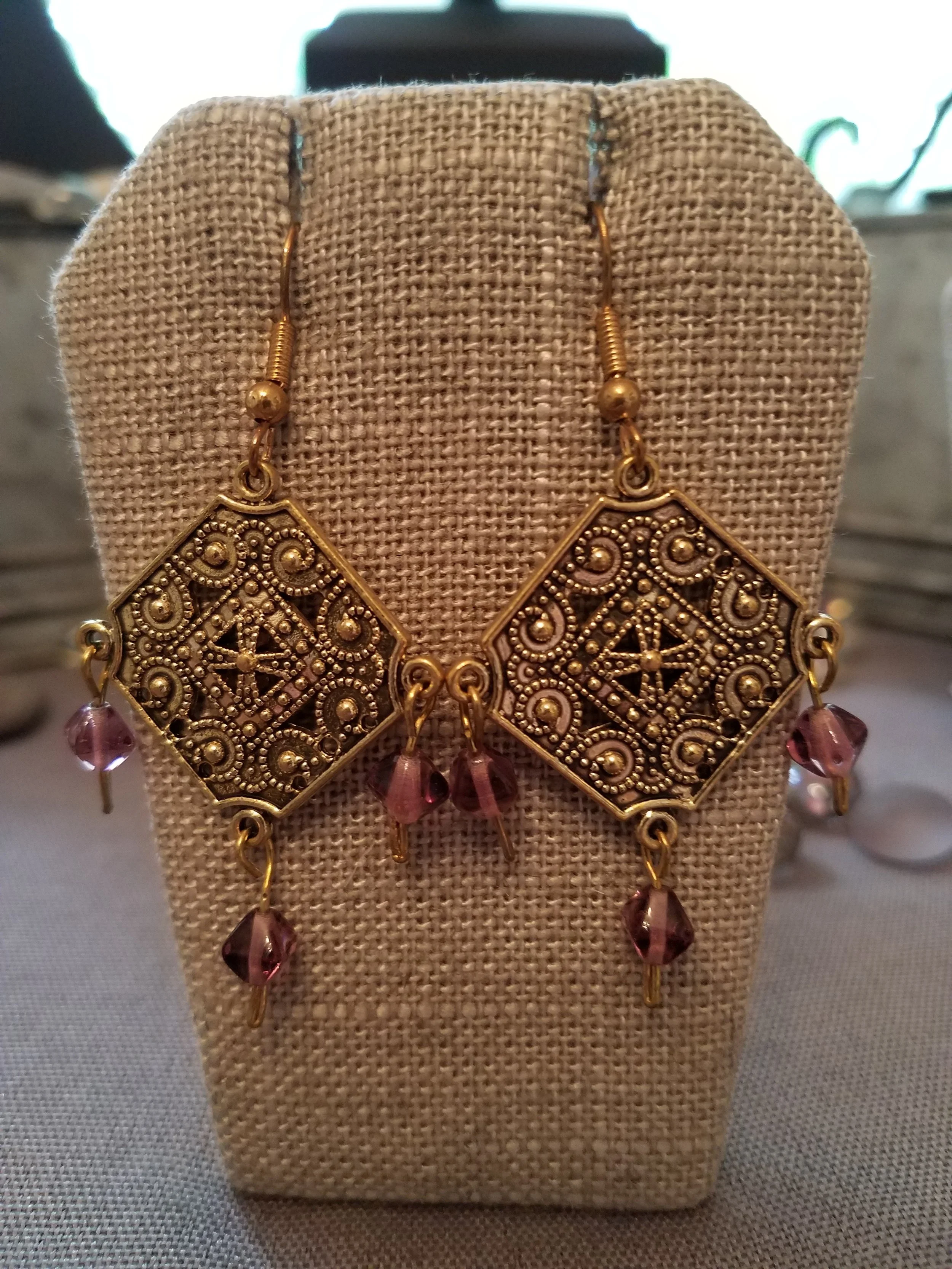 Antique gold filigree diamond with purple crystals