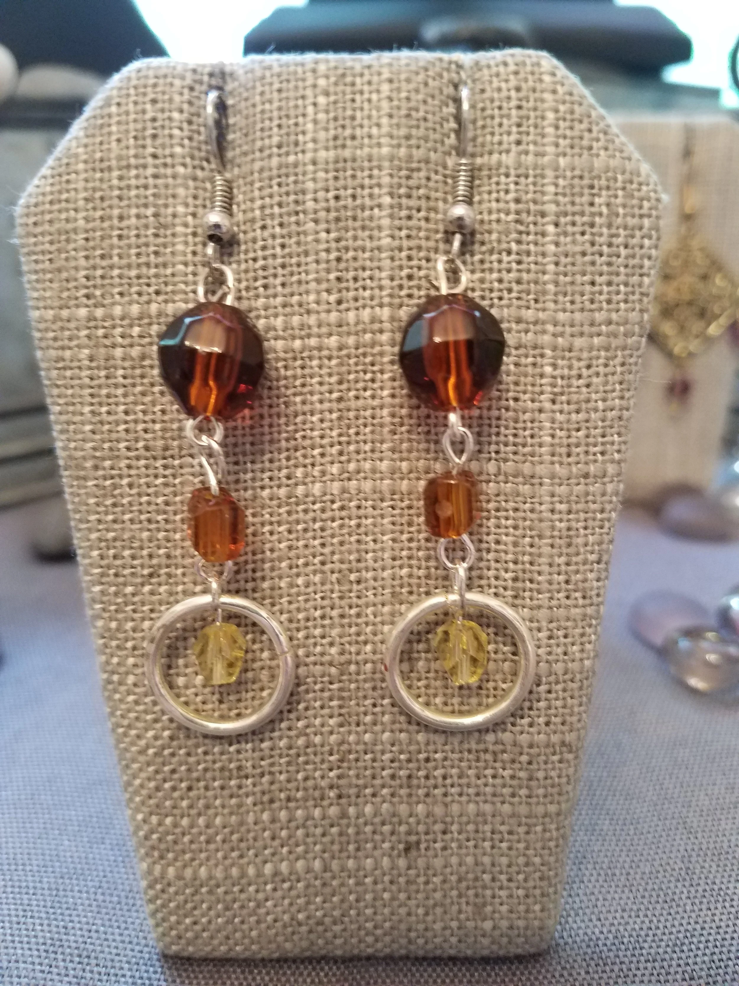 Brown and yellow acrylic beads silver rings