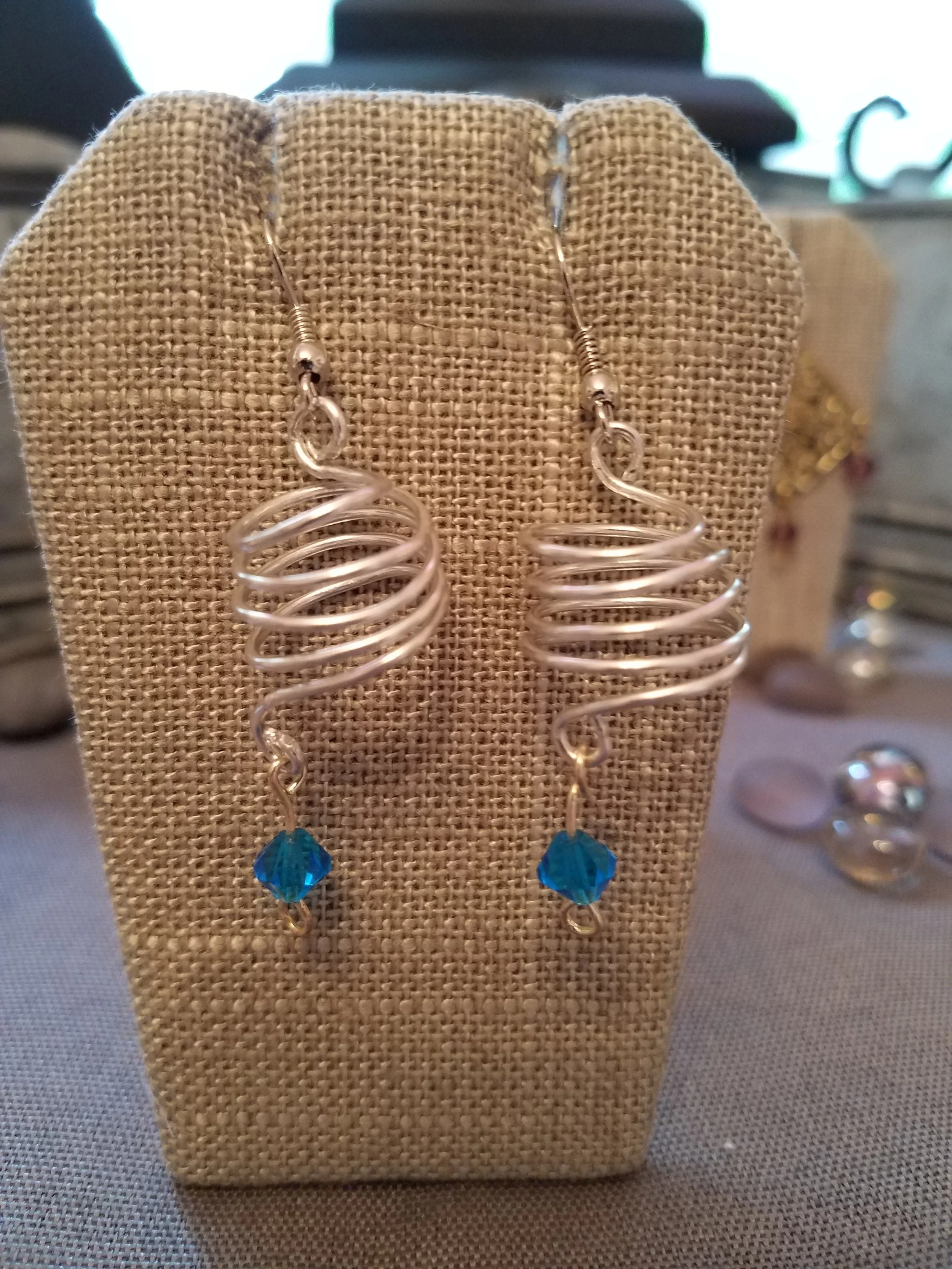 Silver corkscrew blue crystals 