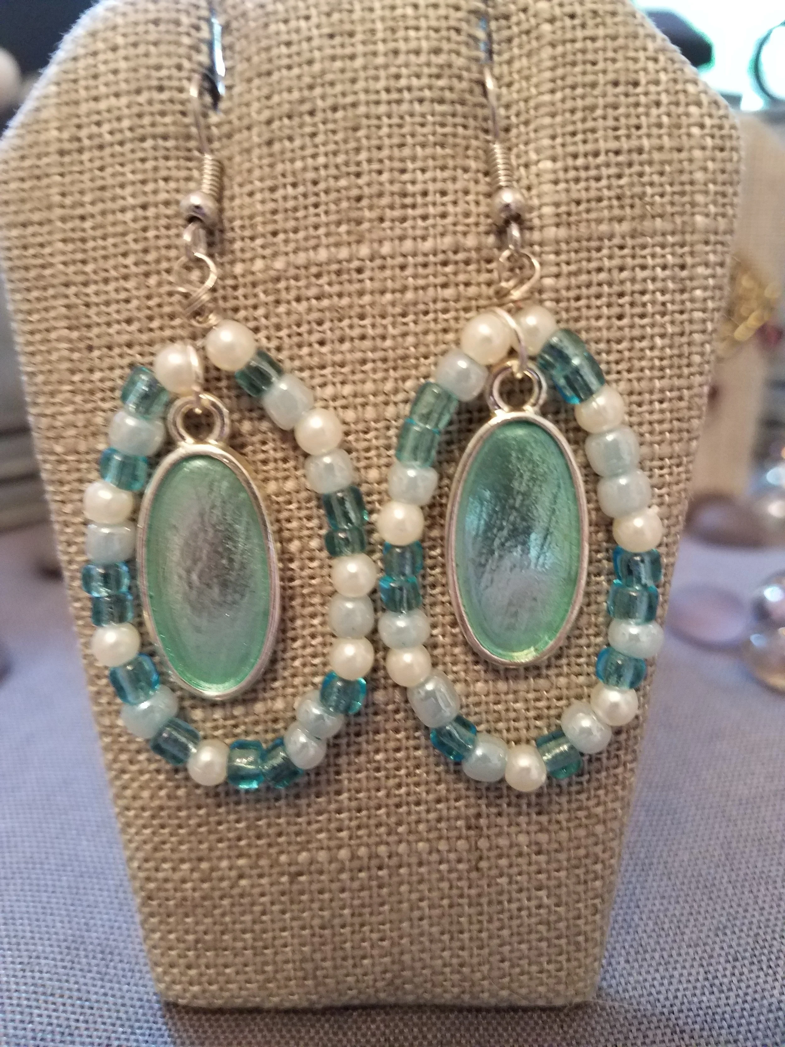 Multi aqua glass beads with aqua enamel drop