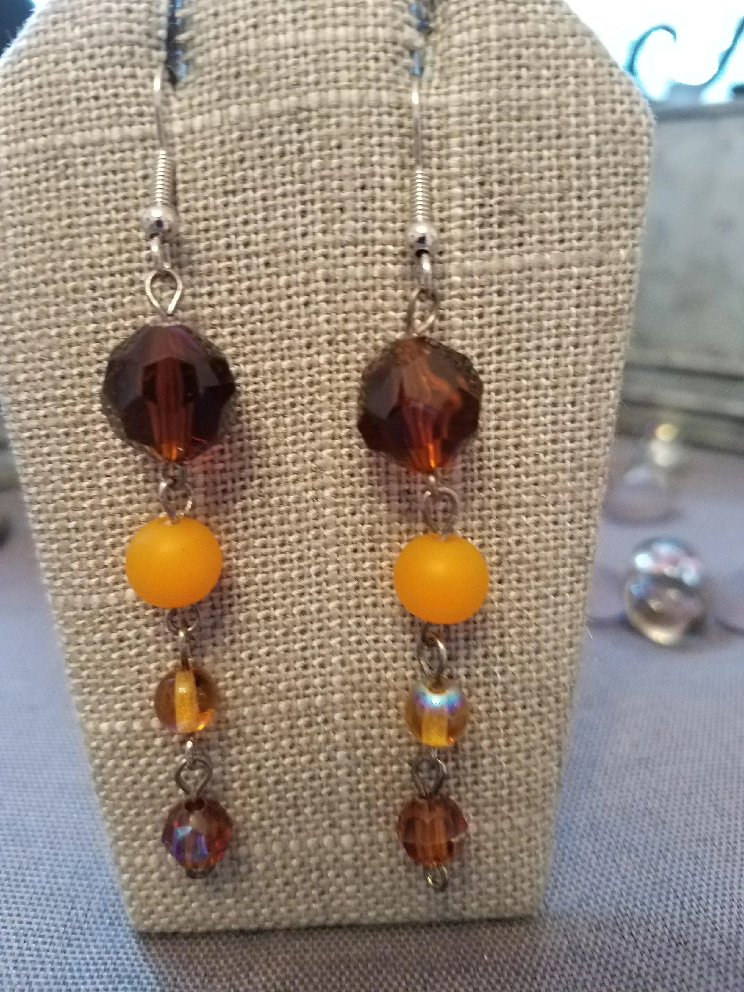Orange, brown, amber, acrylic and glass beads