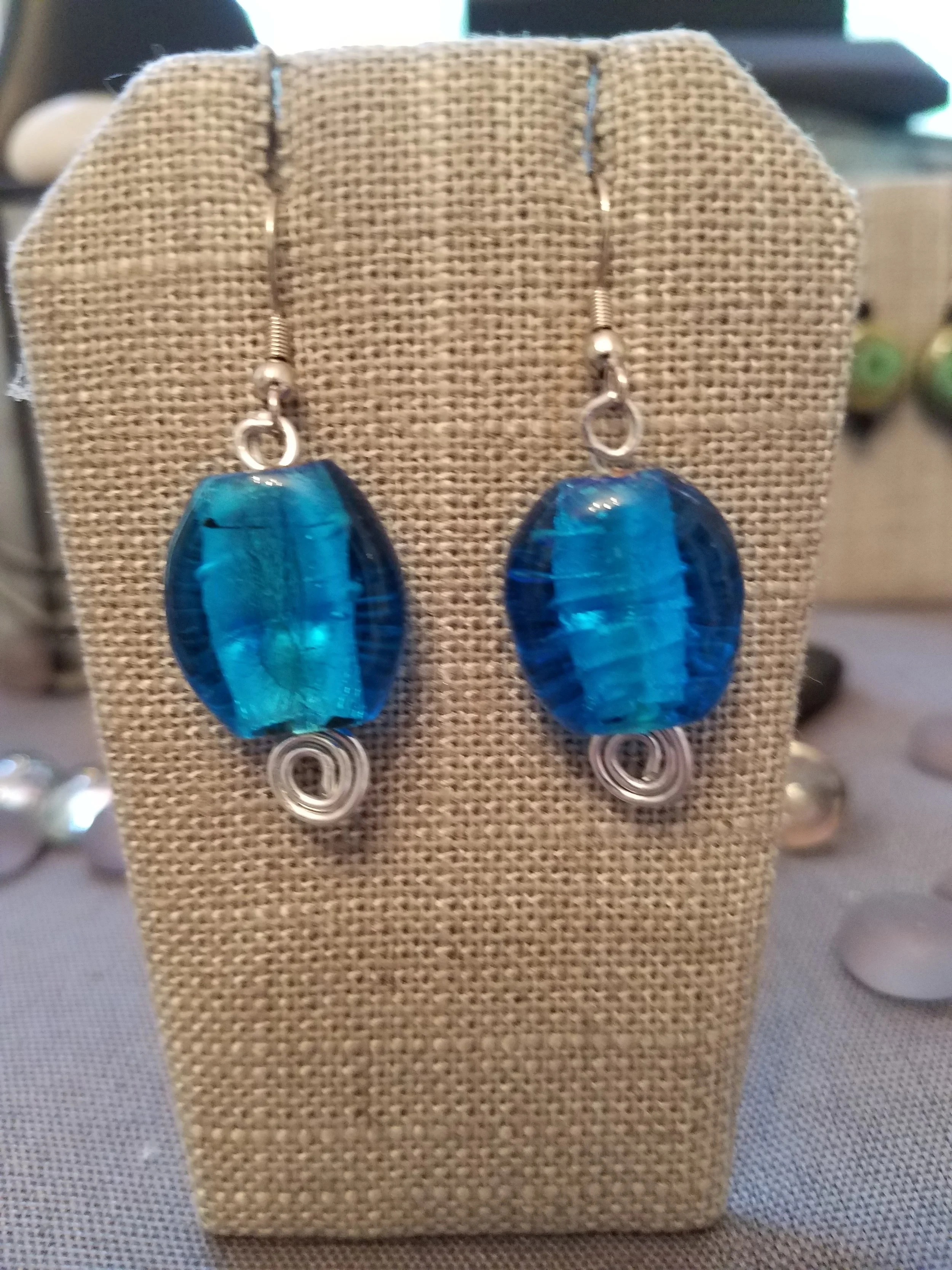 Small blue murano foil glass bead with silver curls