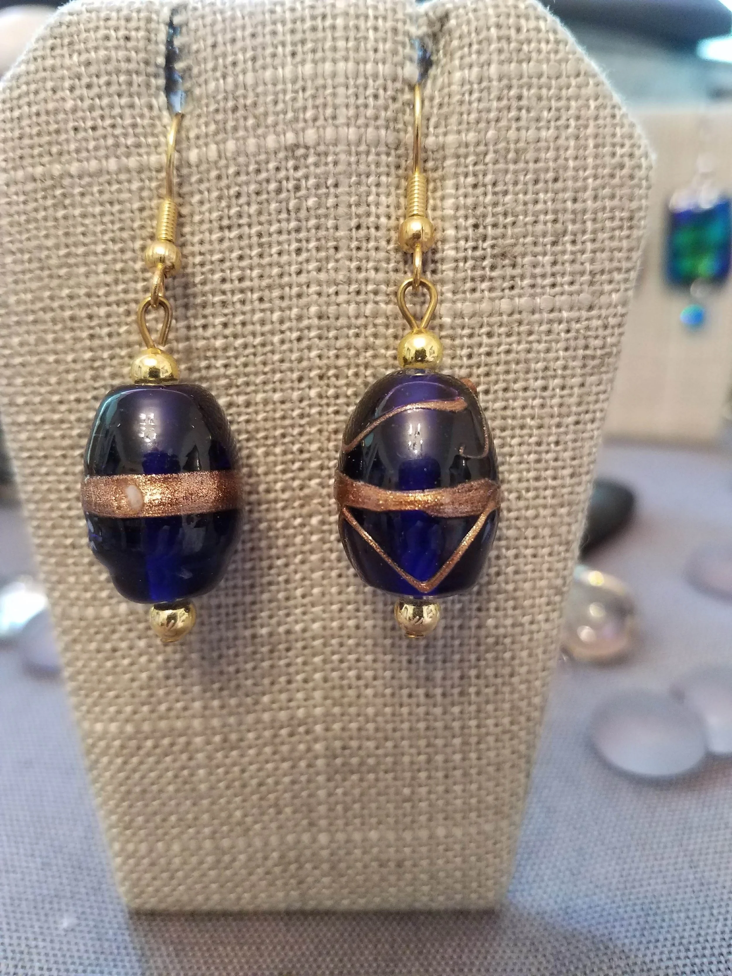 Dark purple murano glass bean with gold balls