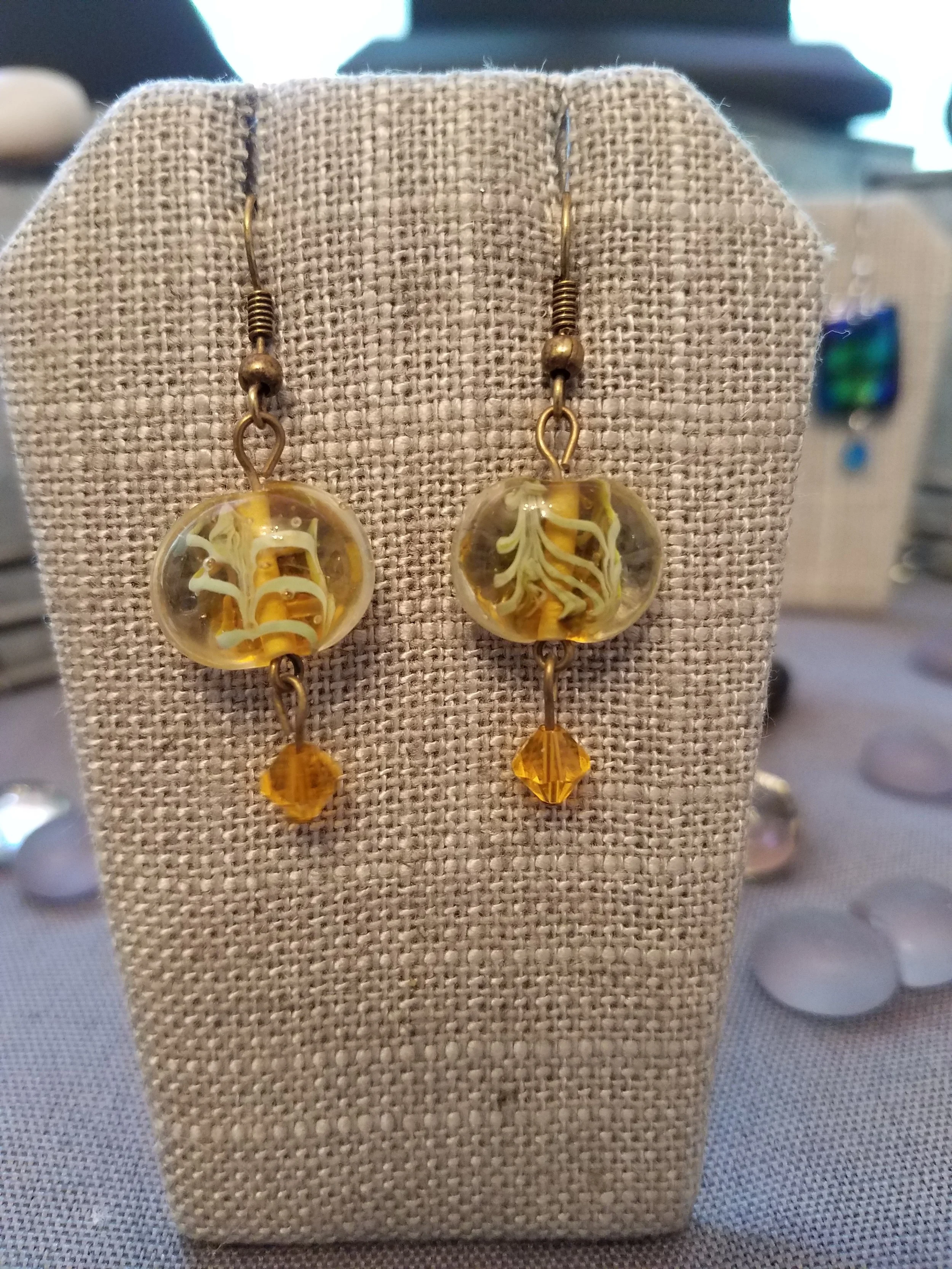 Green lampwork beads with yellow crystals 