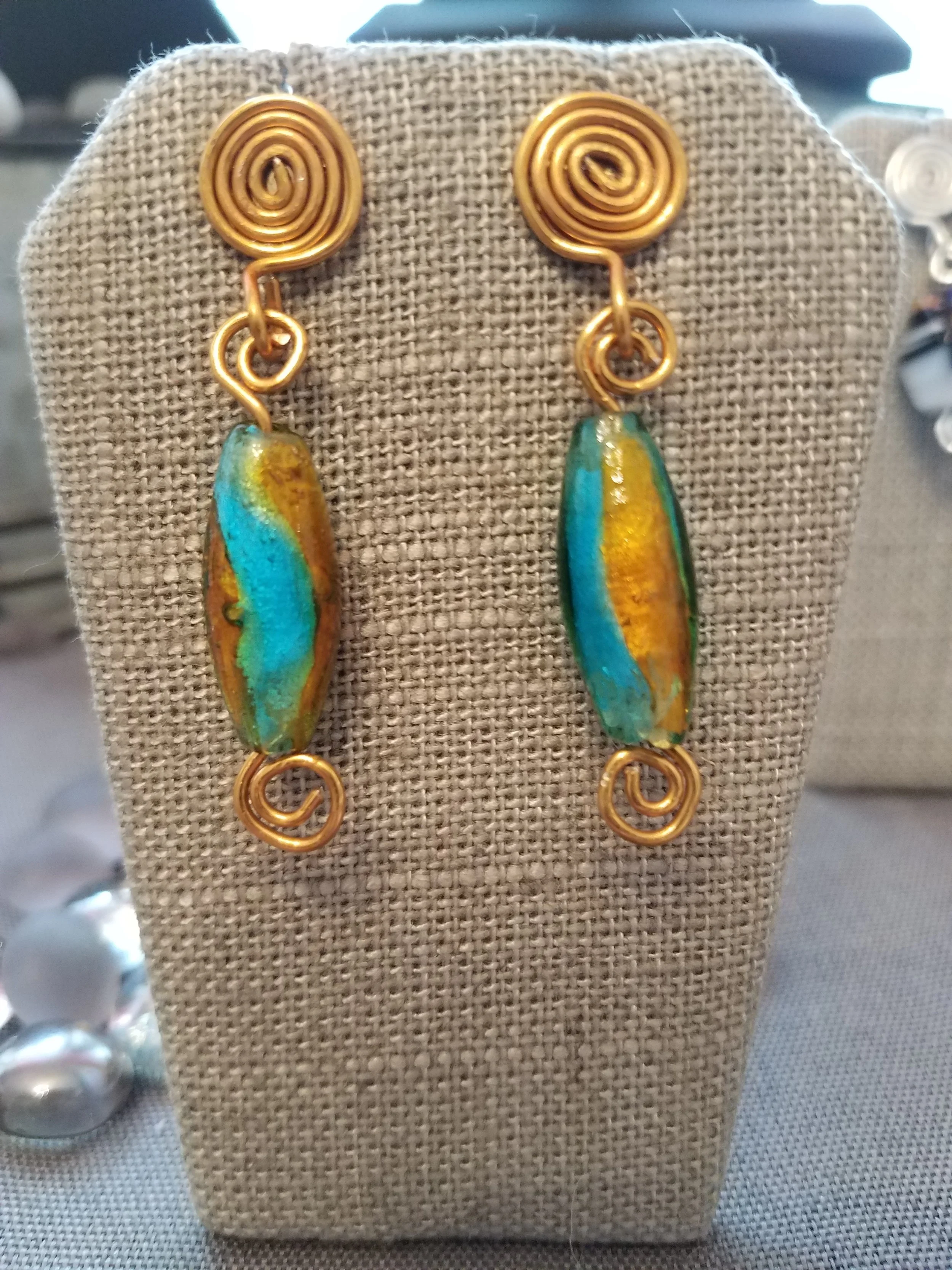 Murano turquoise blue foil bead with copper curls post earrings