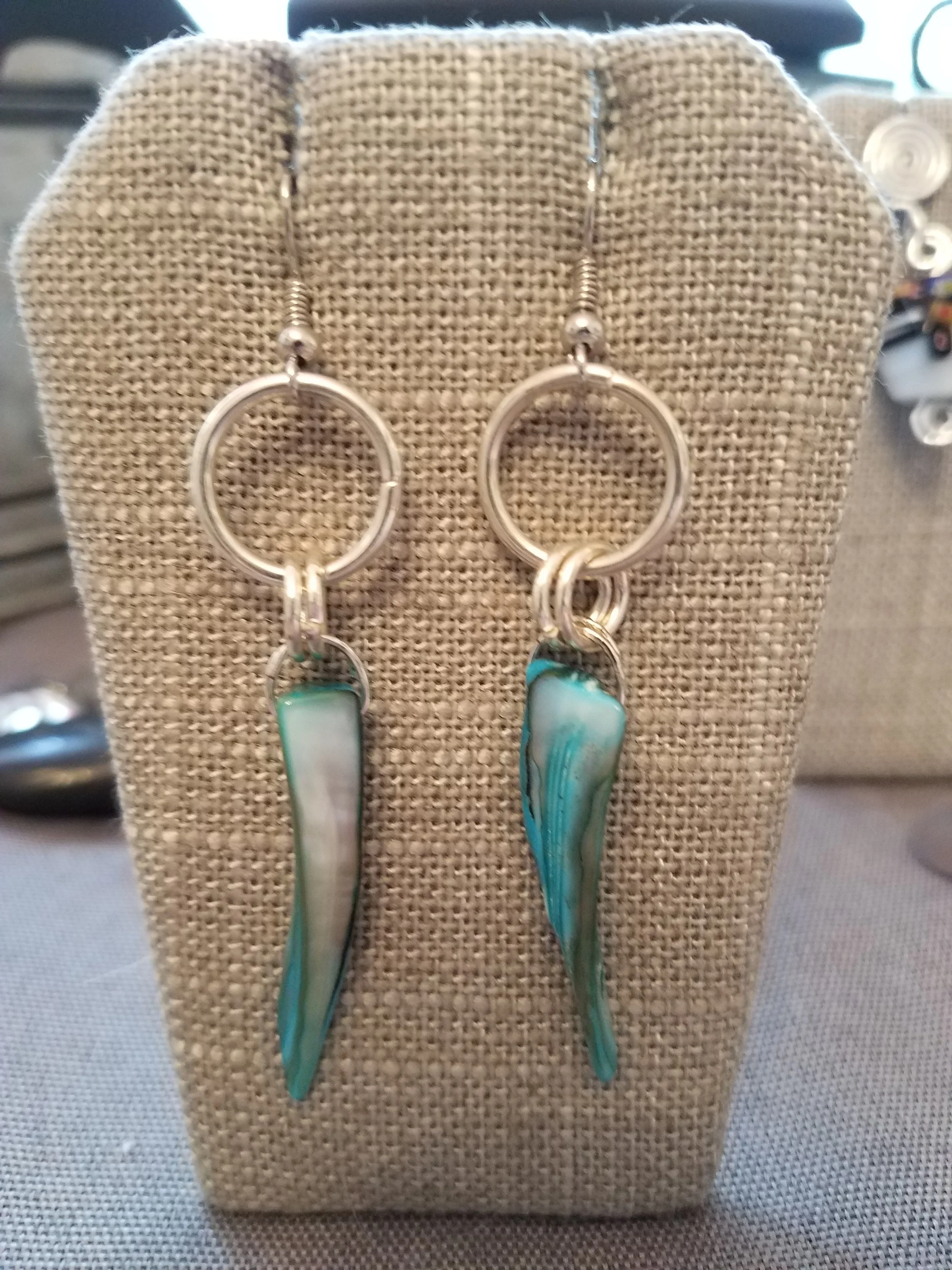 Turquoise shell with silver rings