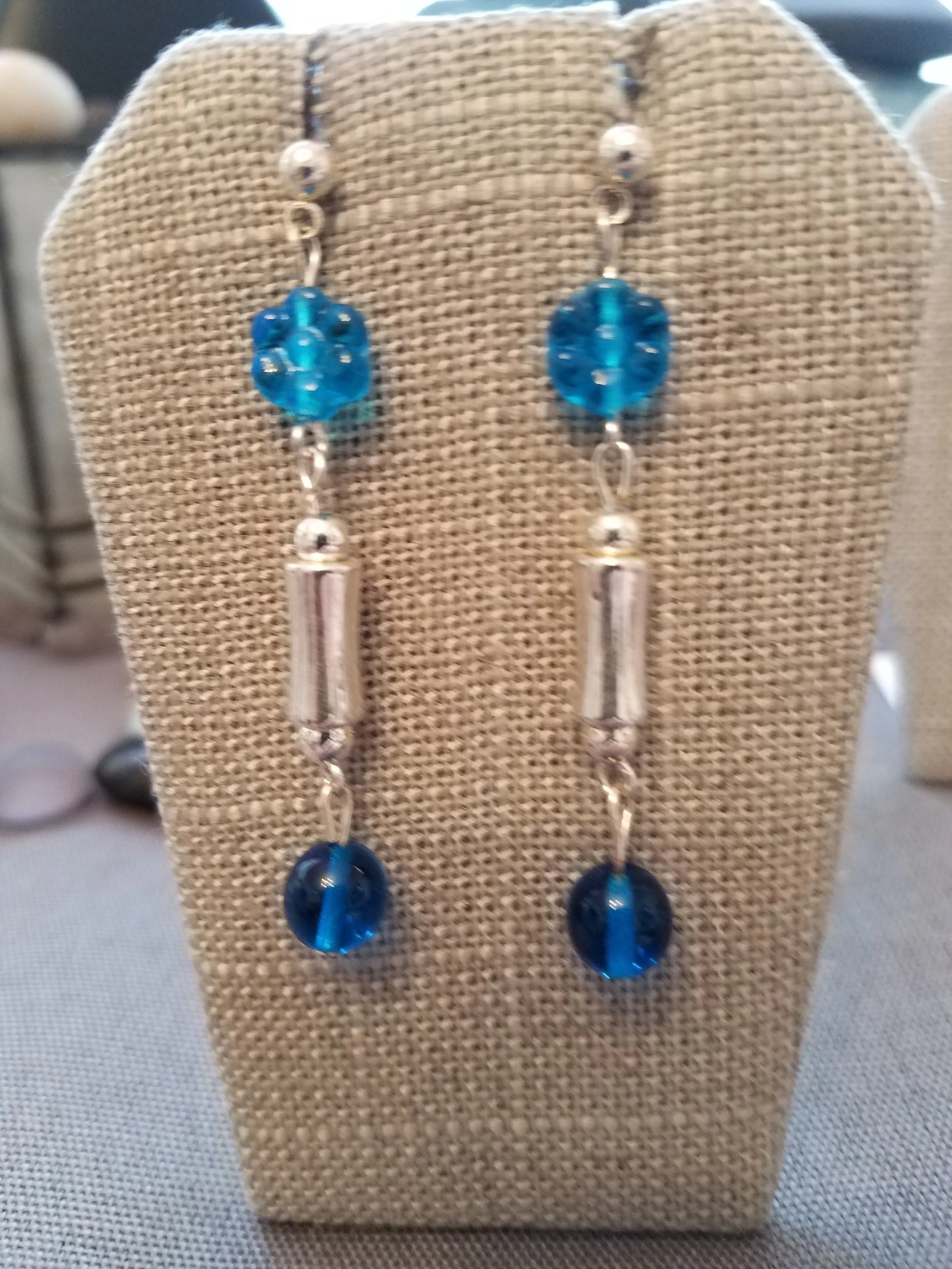Blue glass beads and silver bar