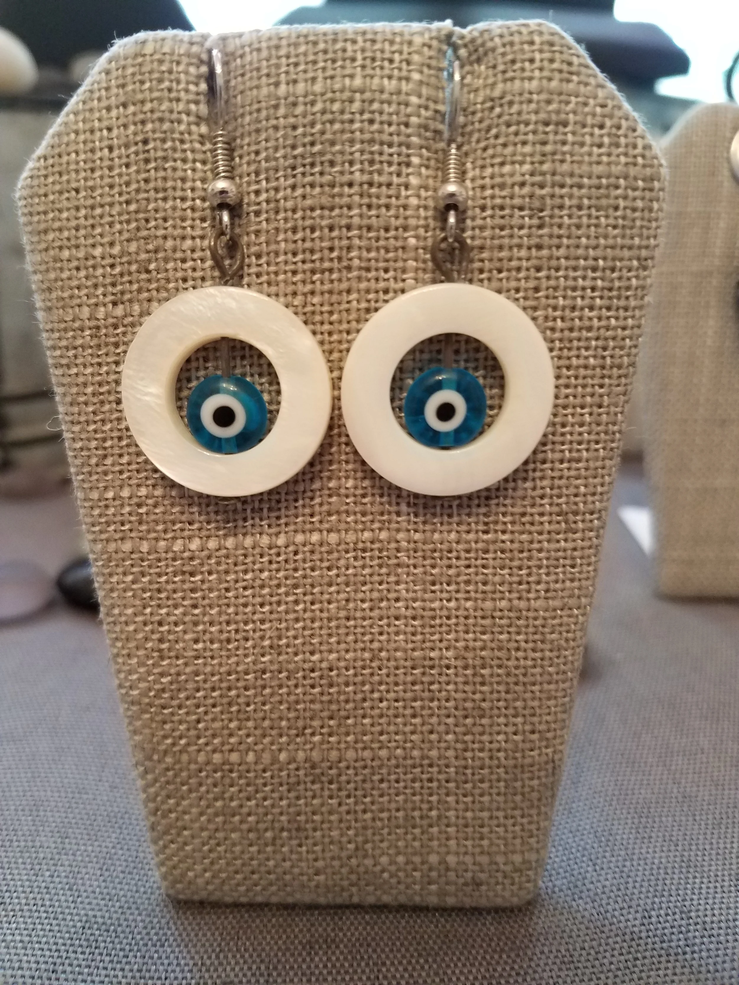 Mother of pearl rings with turquoise millefiori beads