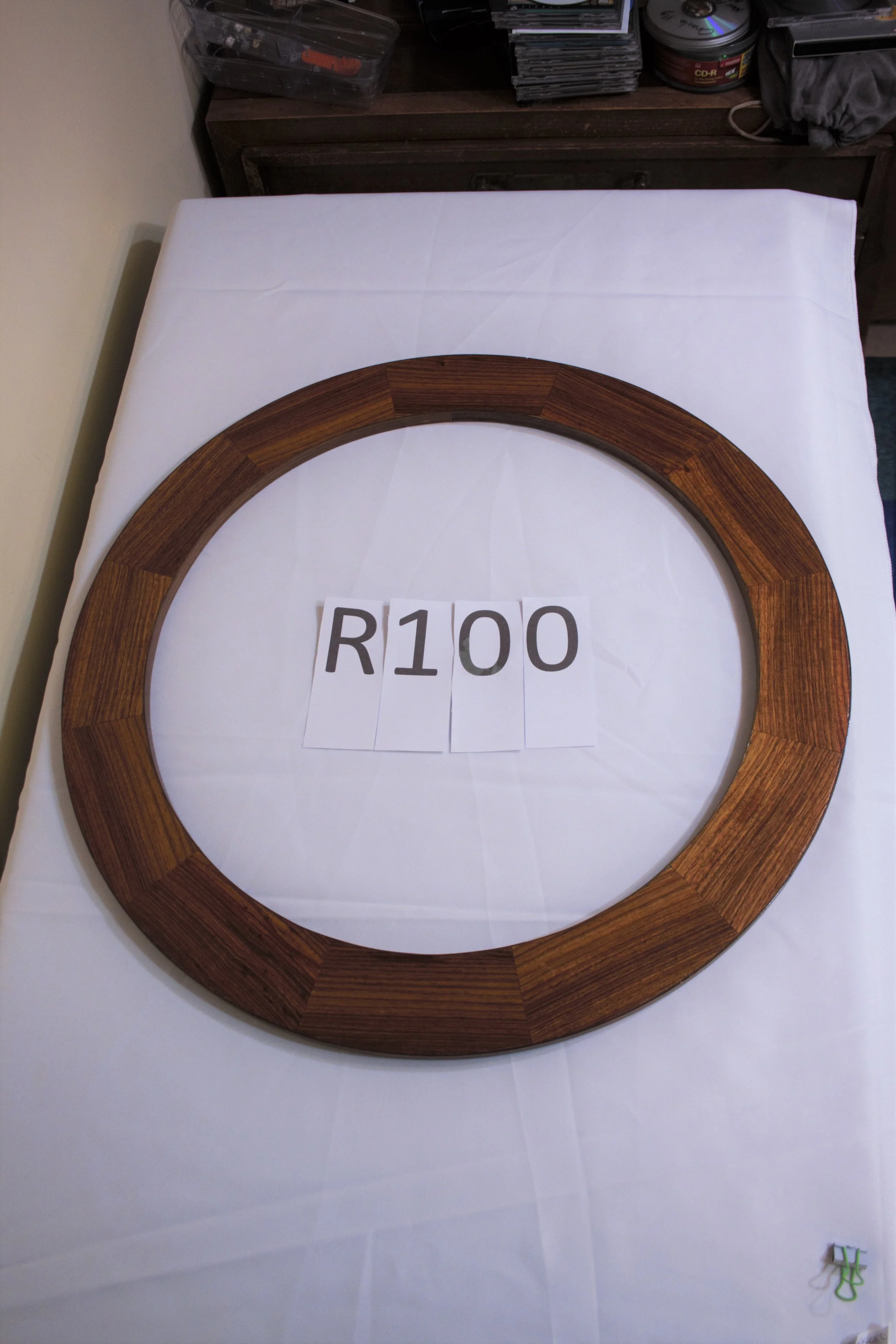 R100