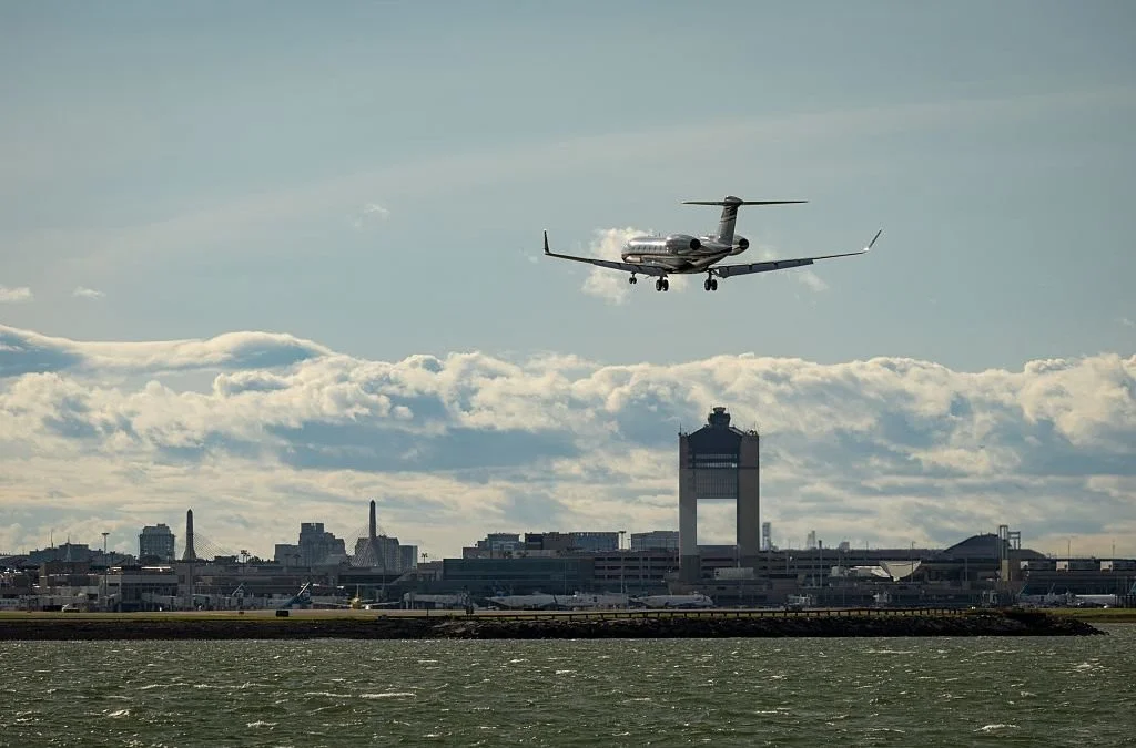 Private jet landing at Boston Logan International Airport