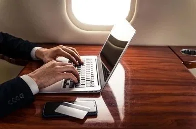 Business traveller onboard a private jet
