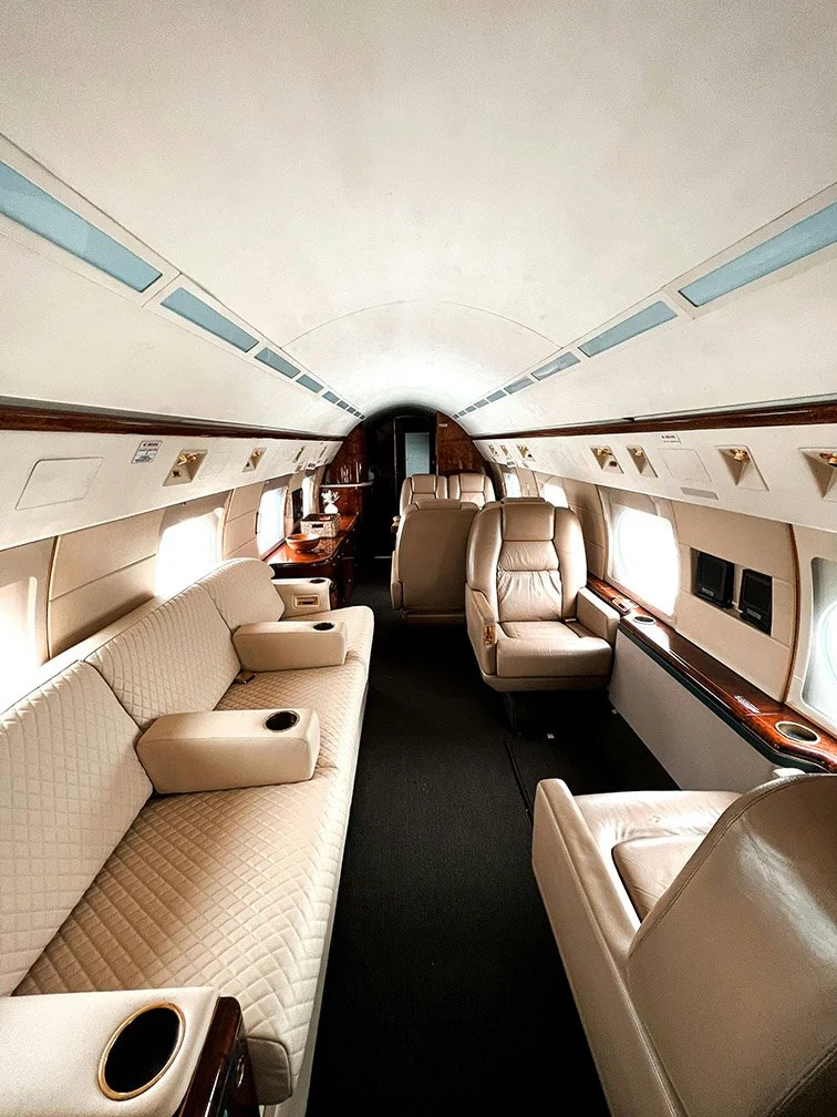 The spacious cabin of a private jet